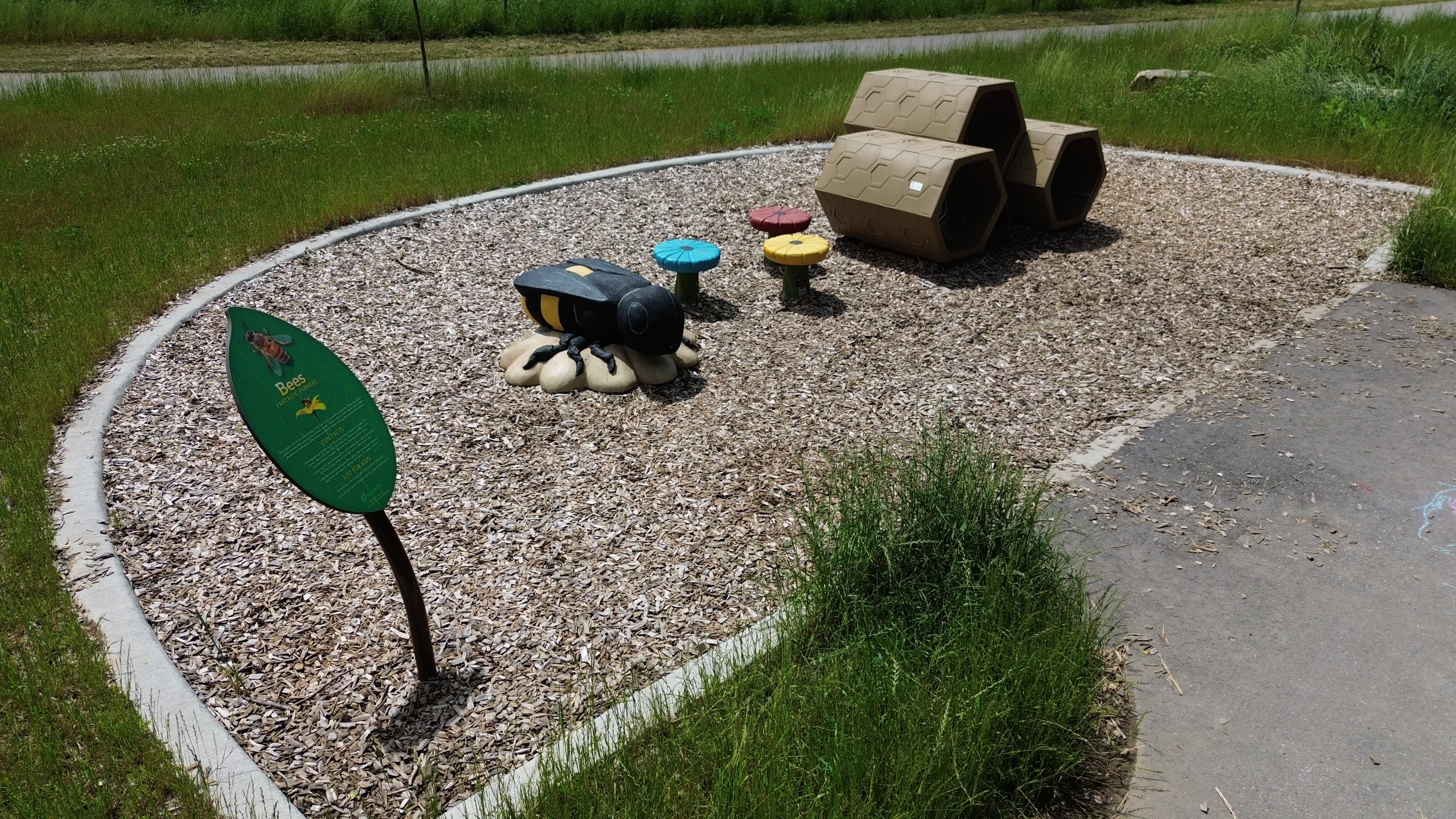 McCormick Park playground equipment in London ON featuring colorful play structures