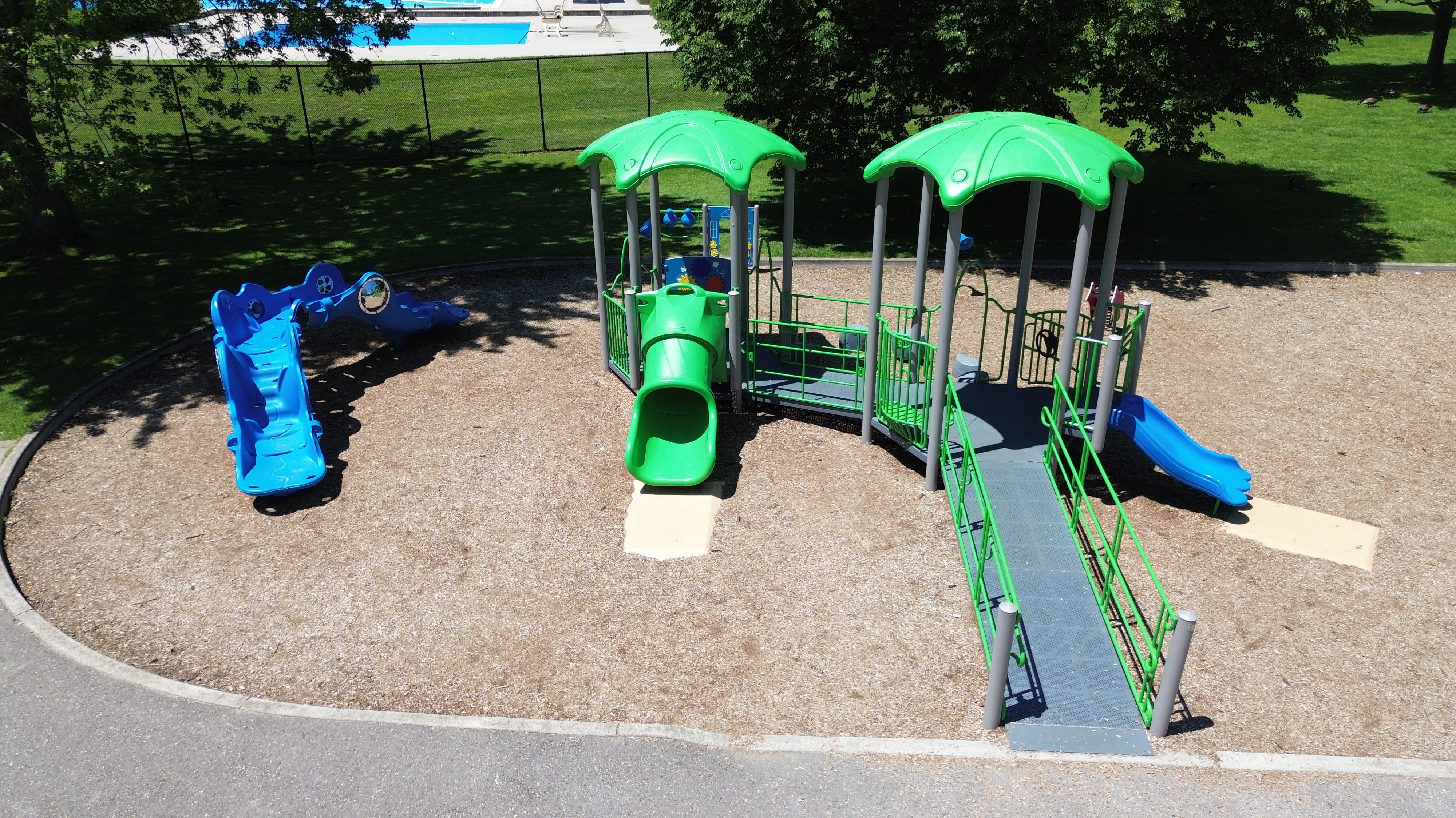 Gibbons Park playground equipment in London, ON with climbing and sliding features