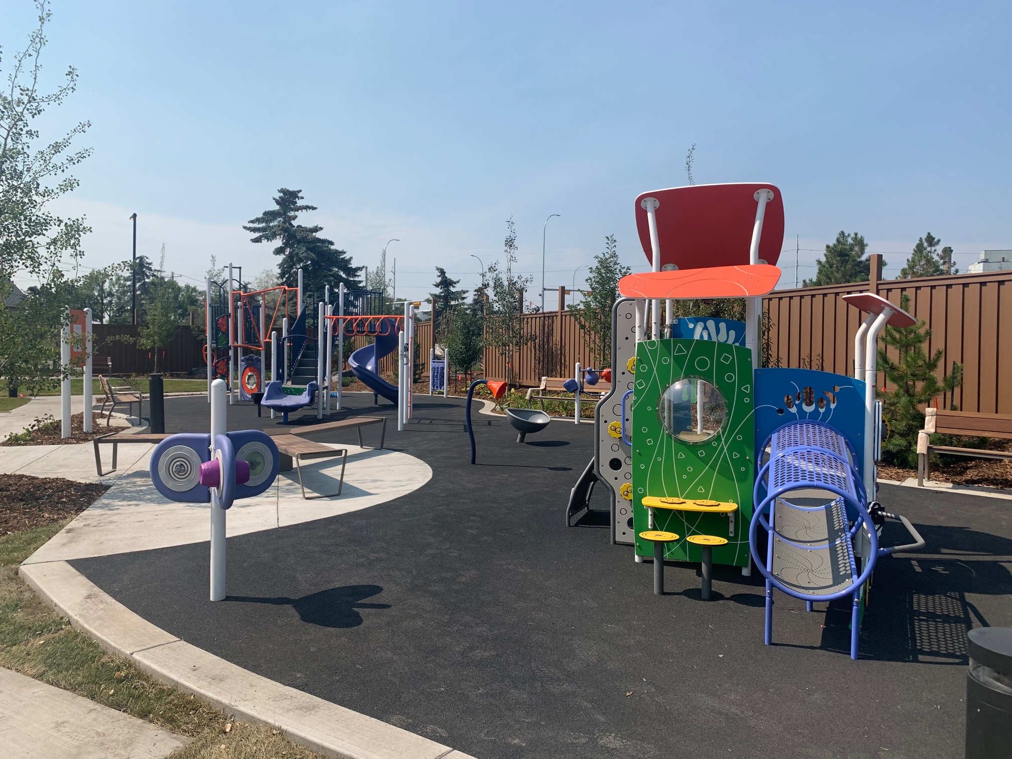 YW Sheriff King playground in Calgary, AB with inclusive community playground