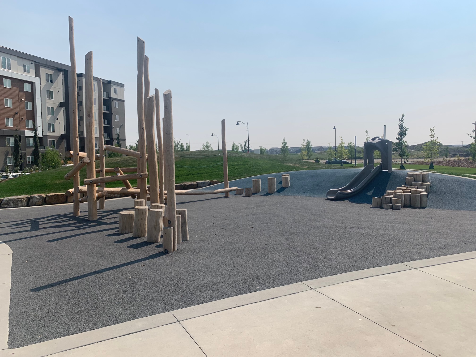Yorkville Central Park playground equipment in Calgary, AB featuring modern playground design