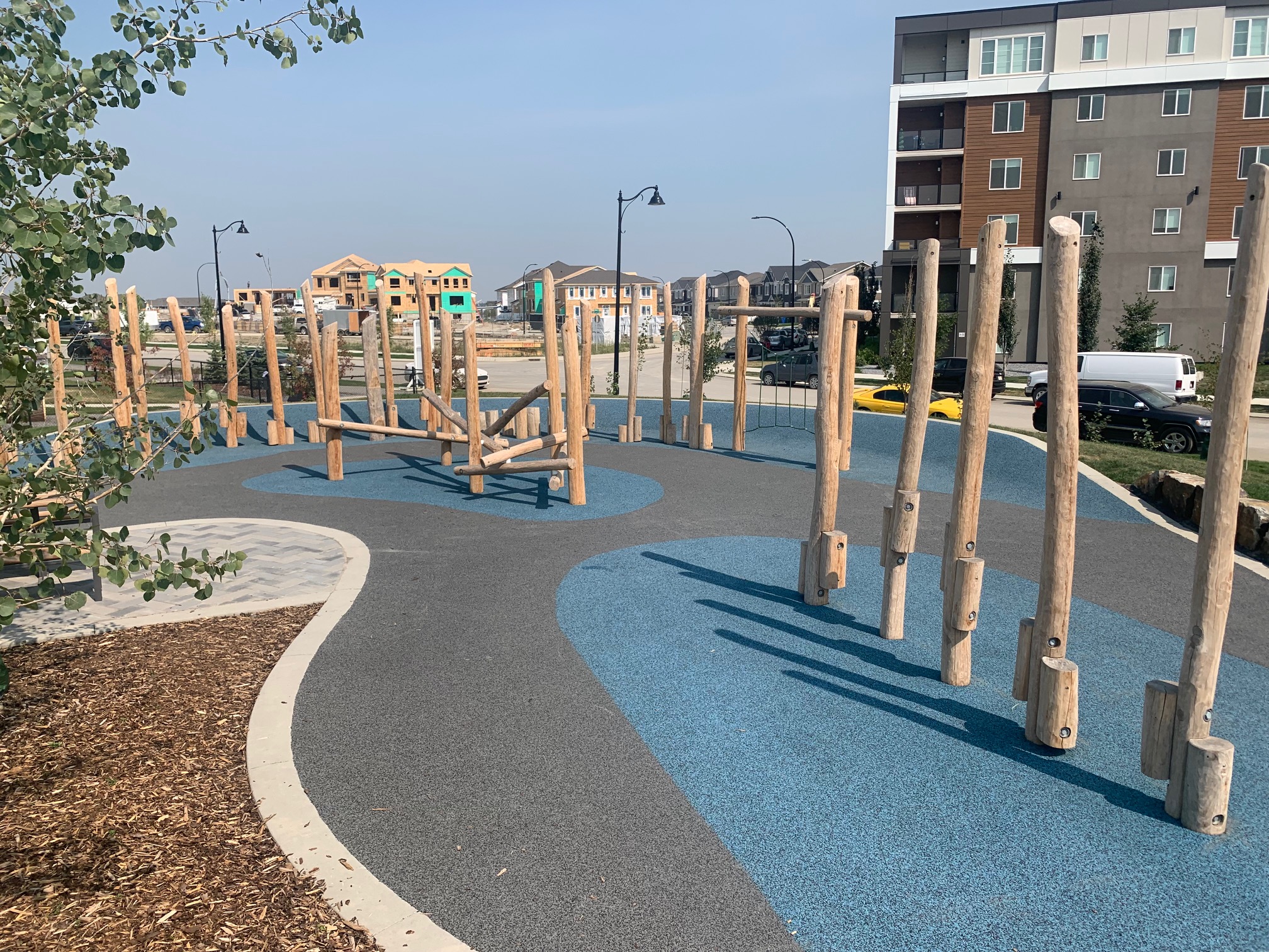 Yorkville Central Park playground equipment in Calgary, AB showing accessible play equipment