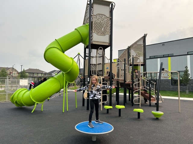 Joan Carr School playground equipment in Edmonton, AB featuring modern playground design