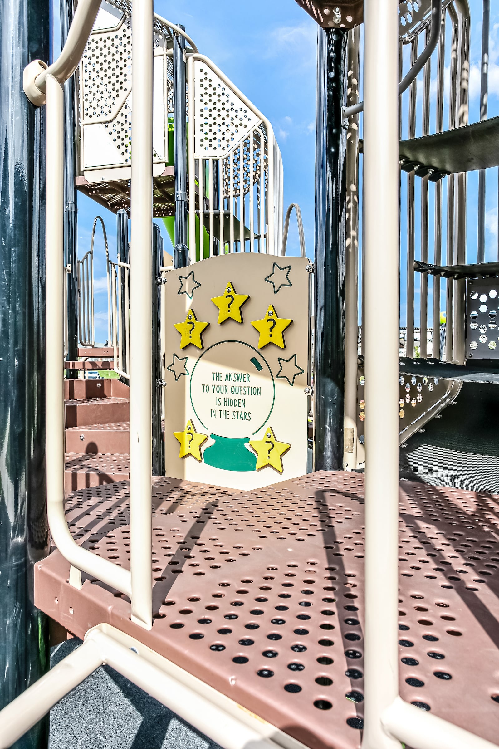 Joan Carr School playground equipment in Edmonton, AB showing themed design elements