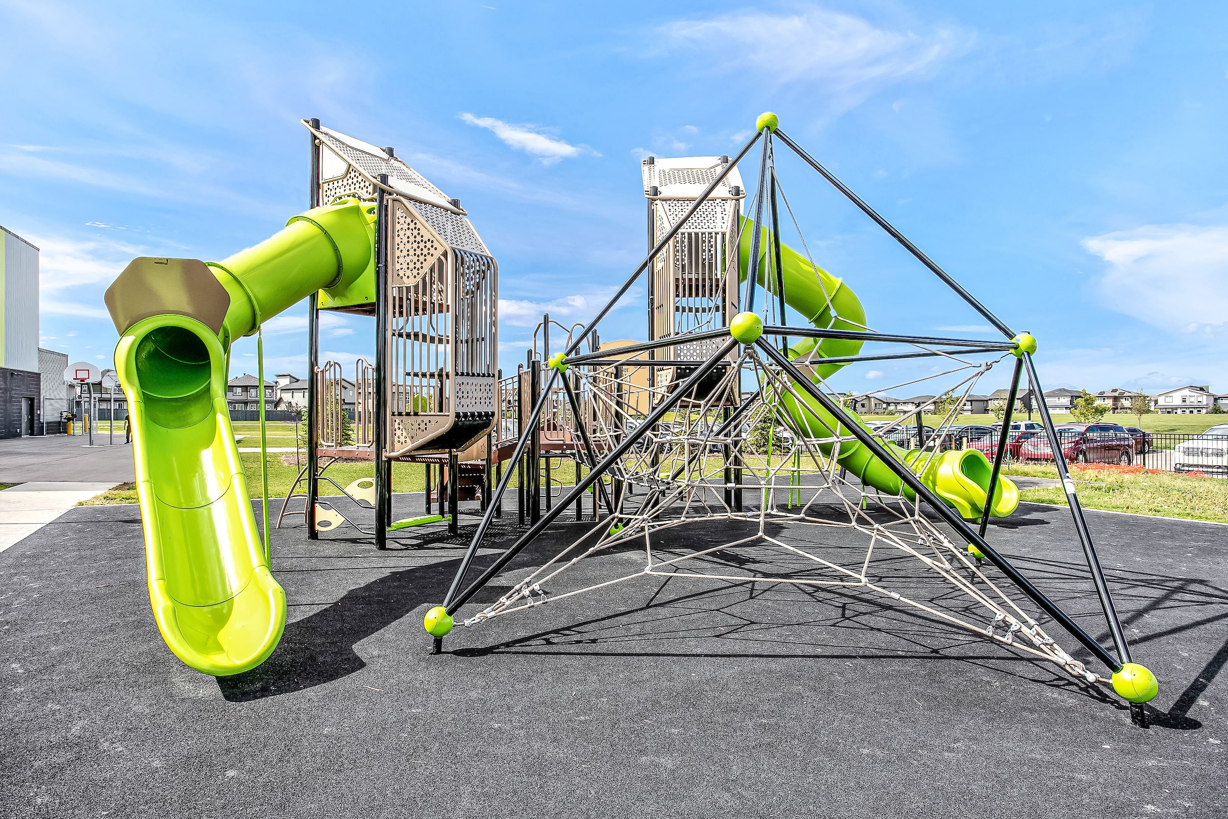 Joan Carr School playground equipment in Edmonton, AB showing community playground space