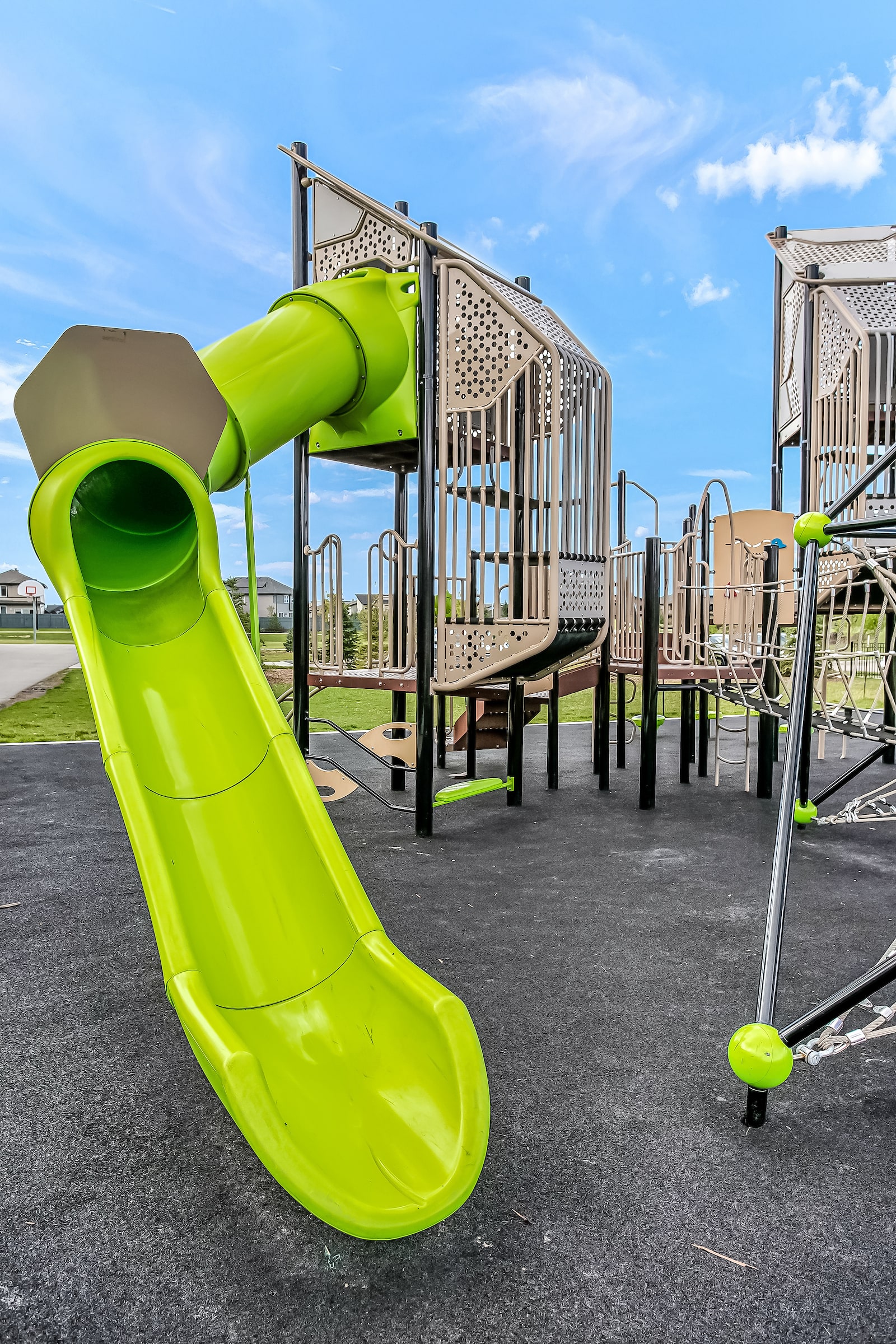 Joan Carr School playground equipment in Edmonton, AB with rope bridges and climbing