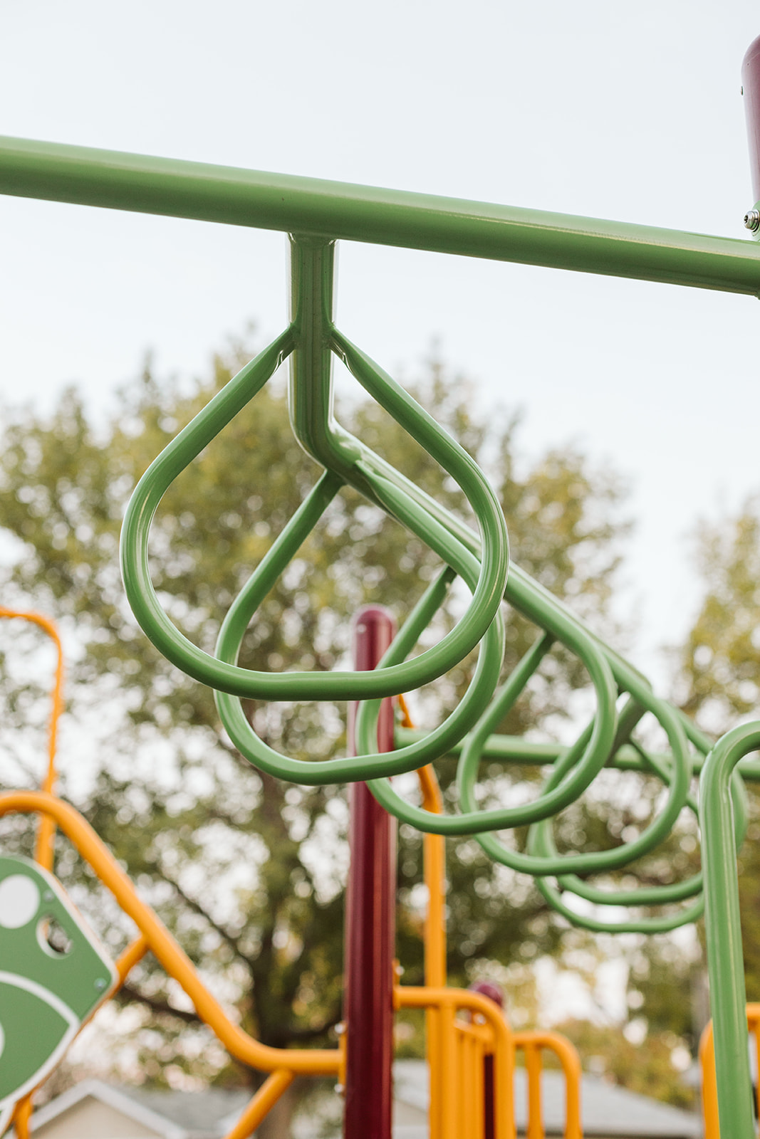 Marchand Park playground equipment in Calgary, AB featuring modern playground design