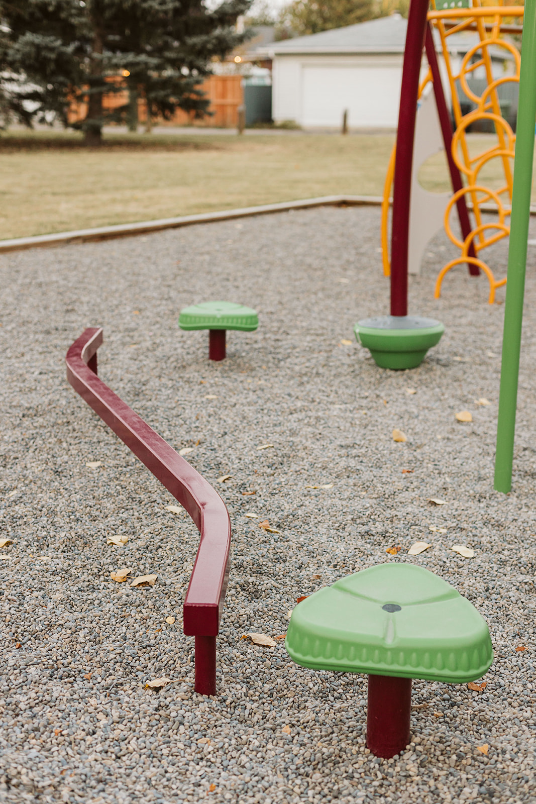 Marchand Park playground equipment in Calgary, AB with inclusive play features