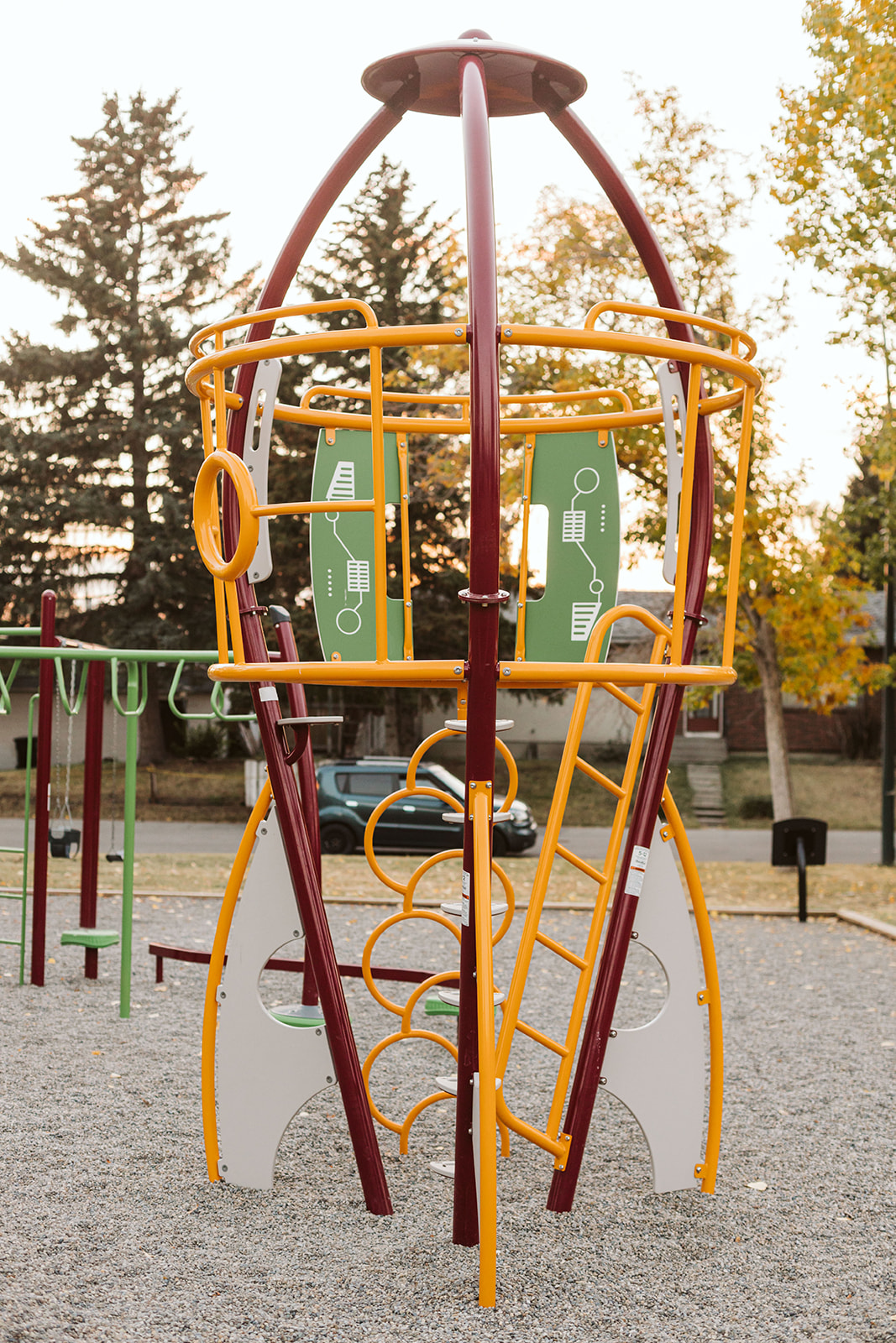 Marchand Park playground equipment in Calgary, AB showing tower structures