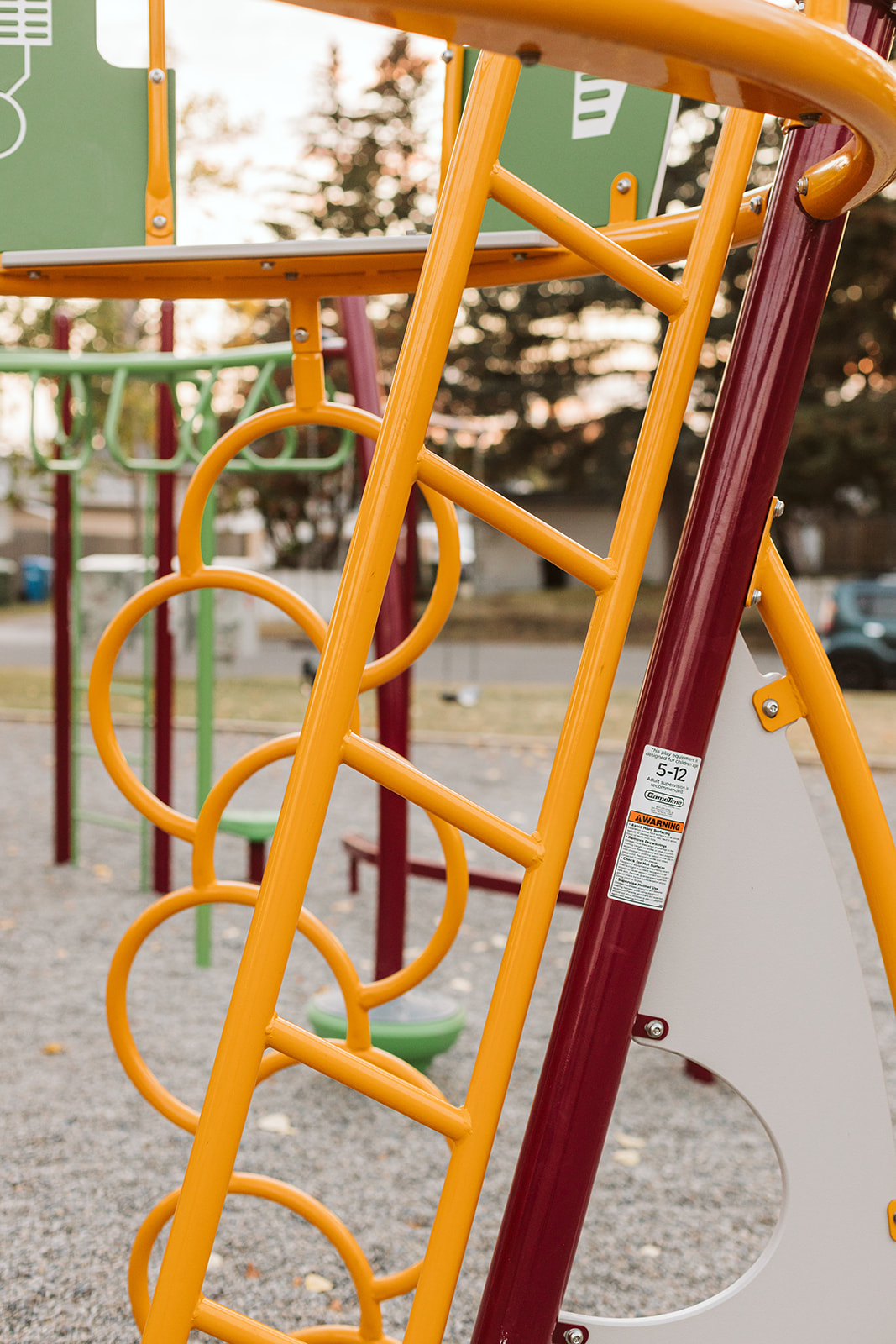 Marchand Park playground equipment in Calgary, AB featuring educational elements
