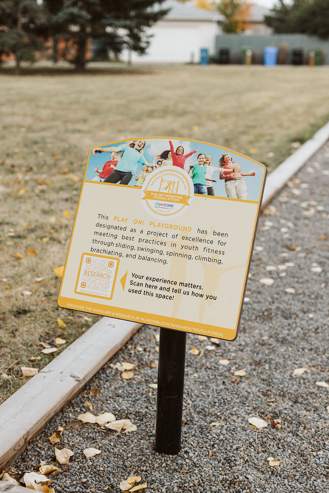 Marchand Park playground equipment in Calgary, AB featuring colorful play structures