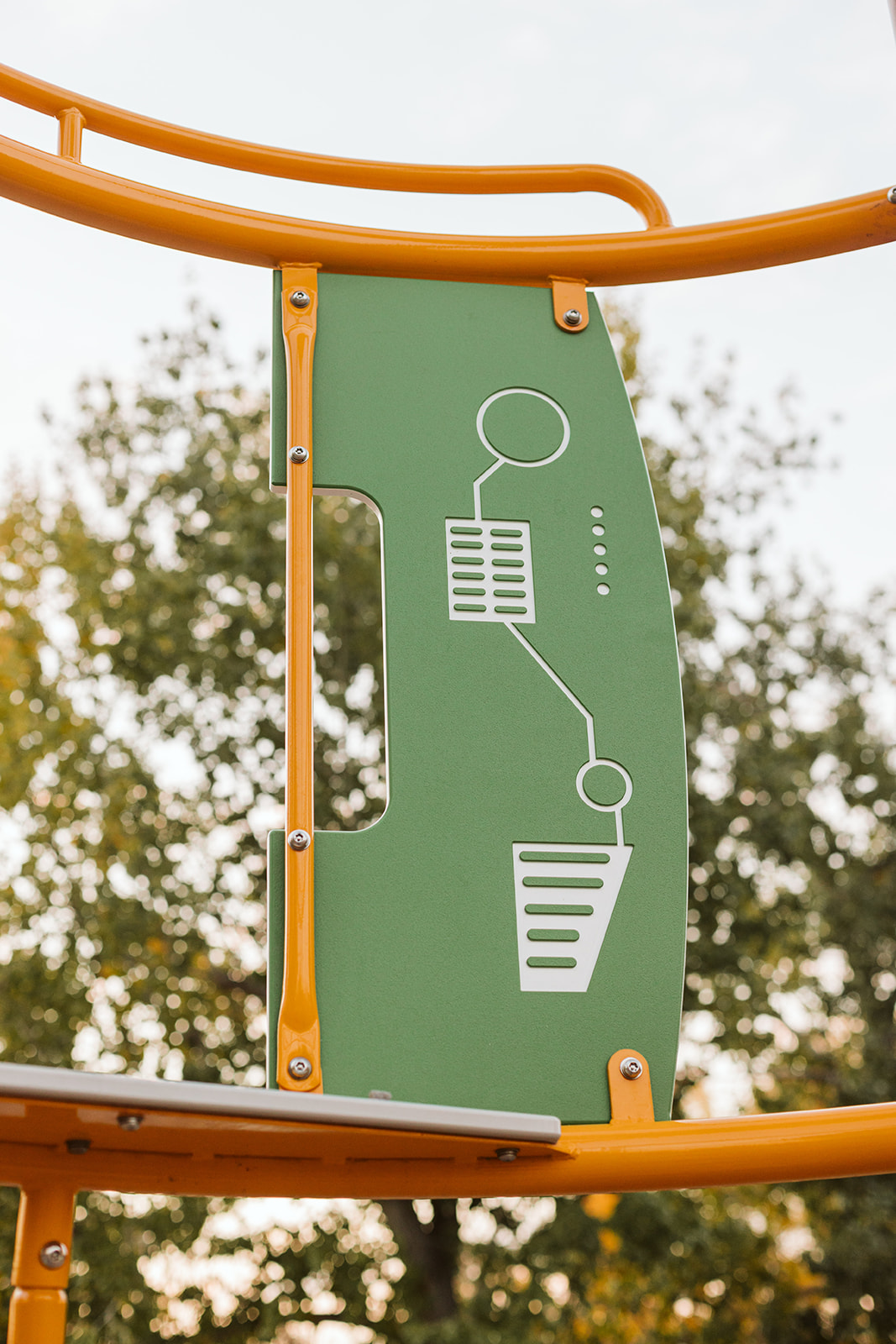 Marchand Park playground equipment in Calgary, AB featuring multi-level structures
