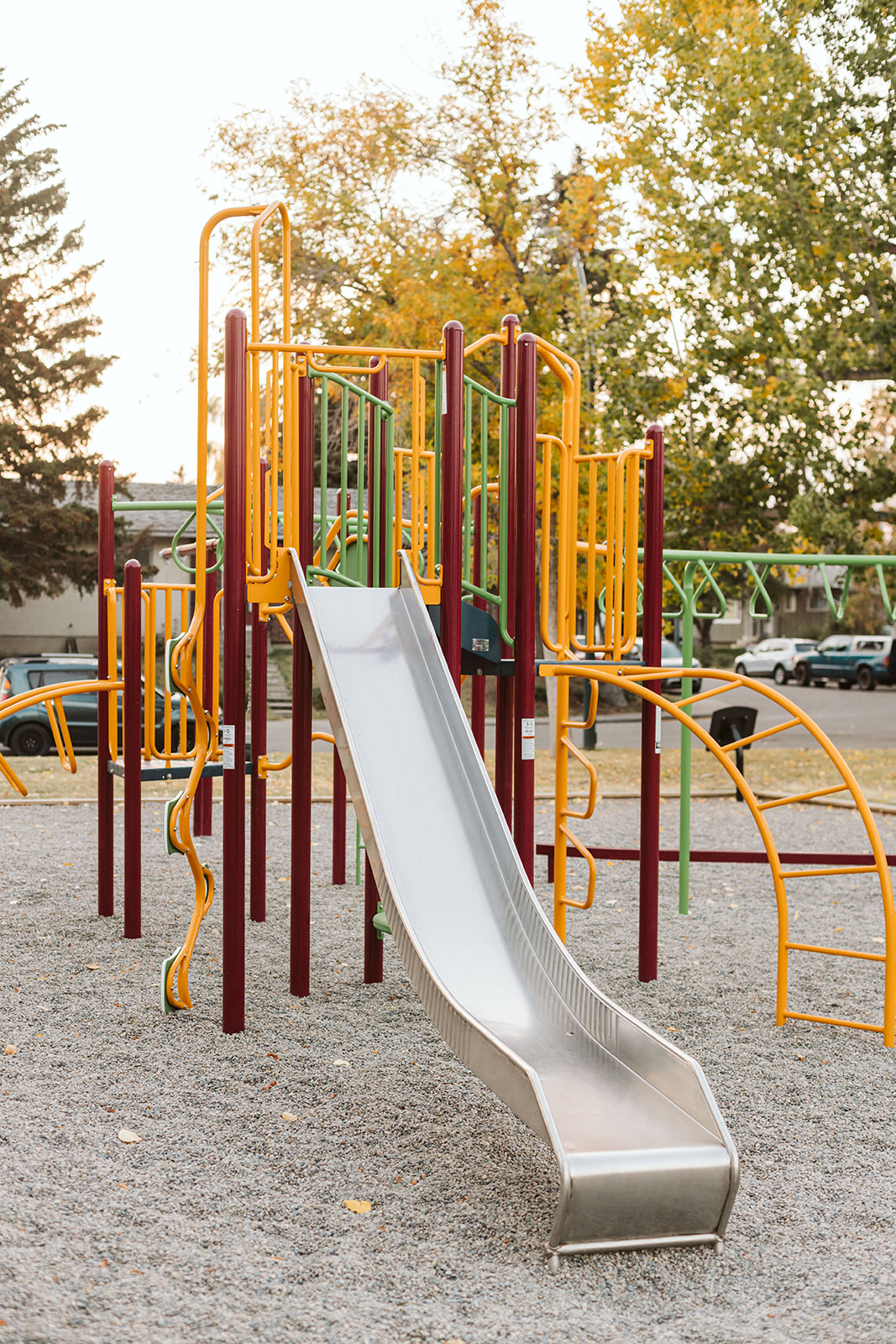 Marchand Park playground equipment in Calgary, AB featuring natural materials and design