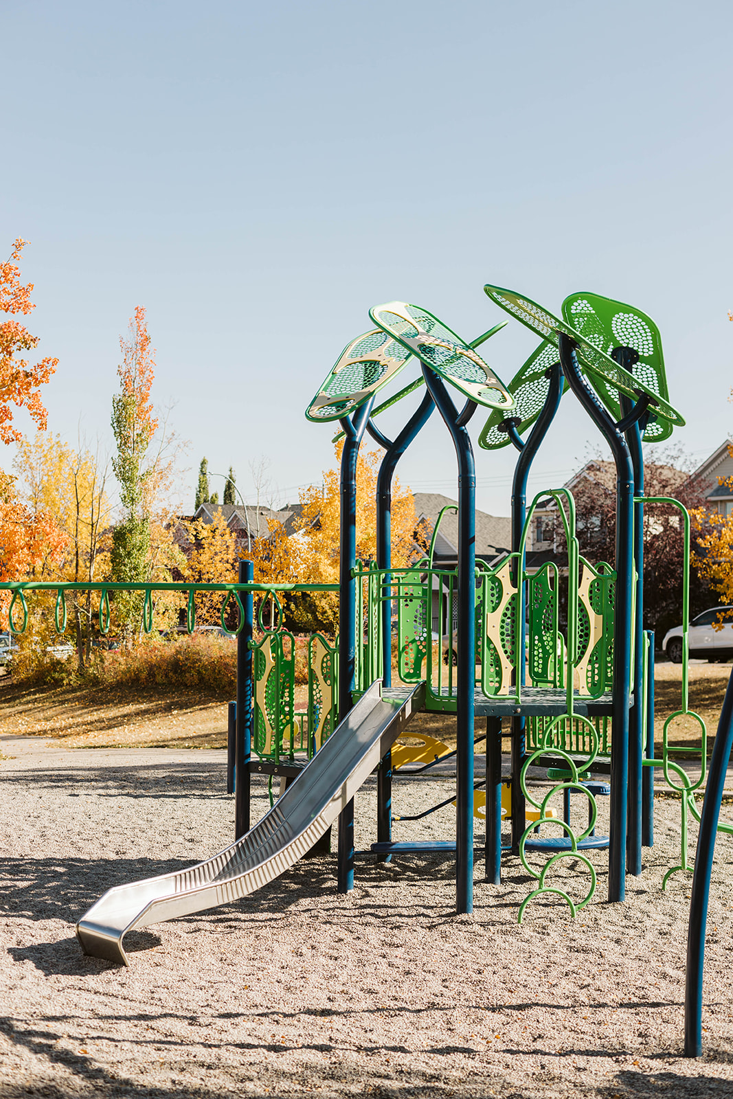 Avalon Playground playground equipment in Calgary, AB with safety surfacing and equipment