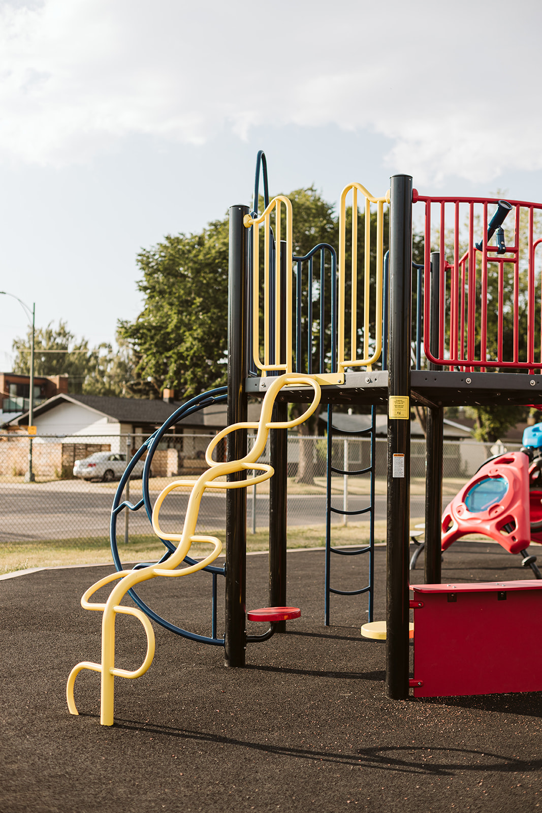 St. Thomas Aquinas School Playground playground equipment in Calgary, AB showing accessible play equipment