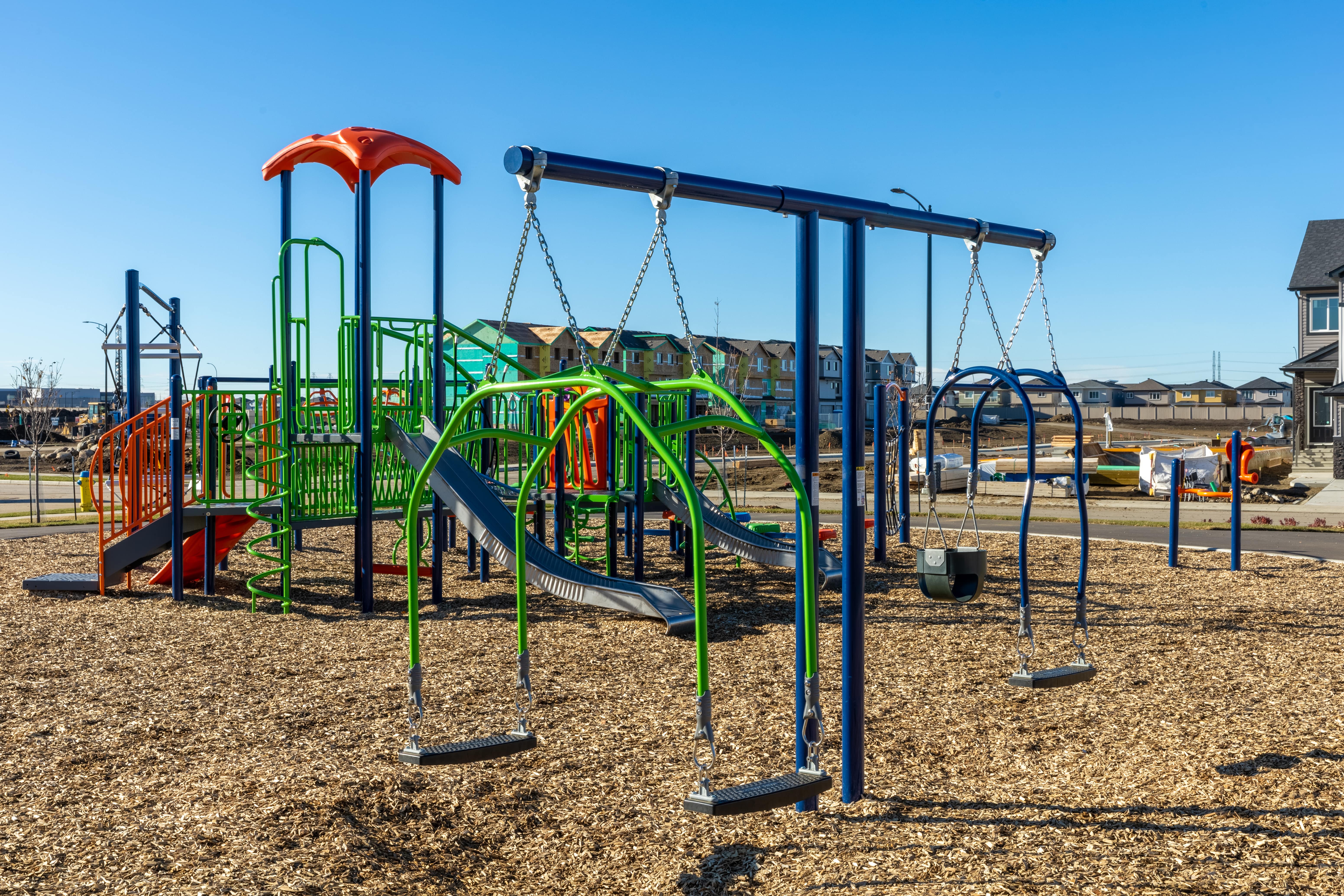 Aster Community Playground playground equipment in Edmonton, AB featuring modern playground design
