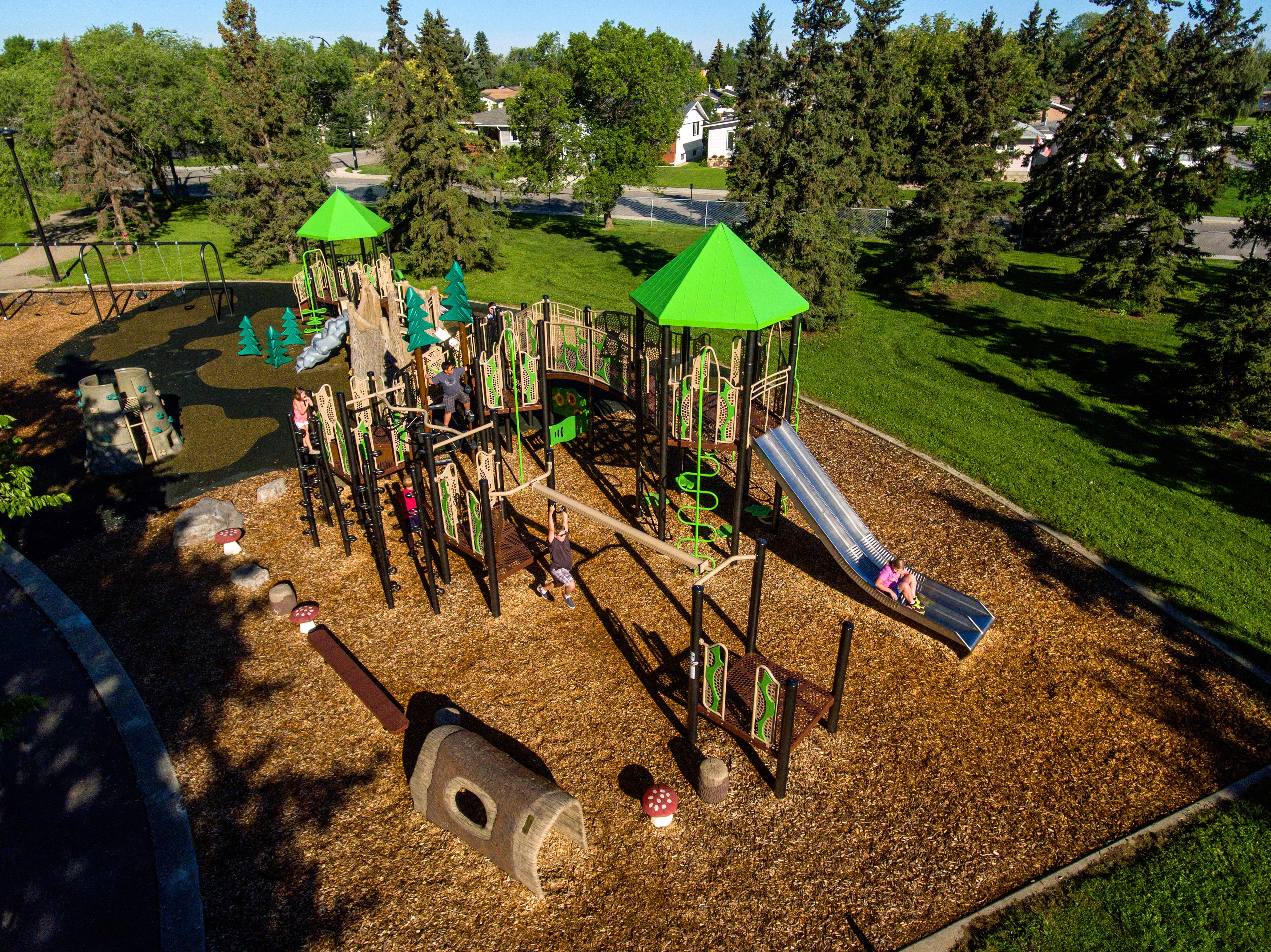 Lendrum "Honey Bee" Themed Park playground equipment in Edmonton, AB with inclusive play features