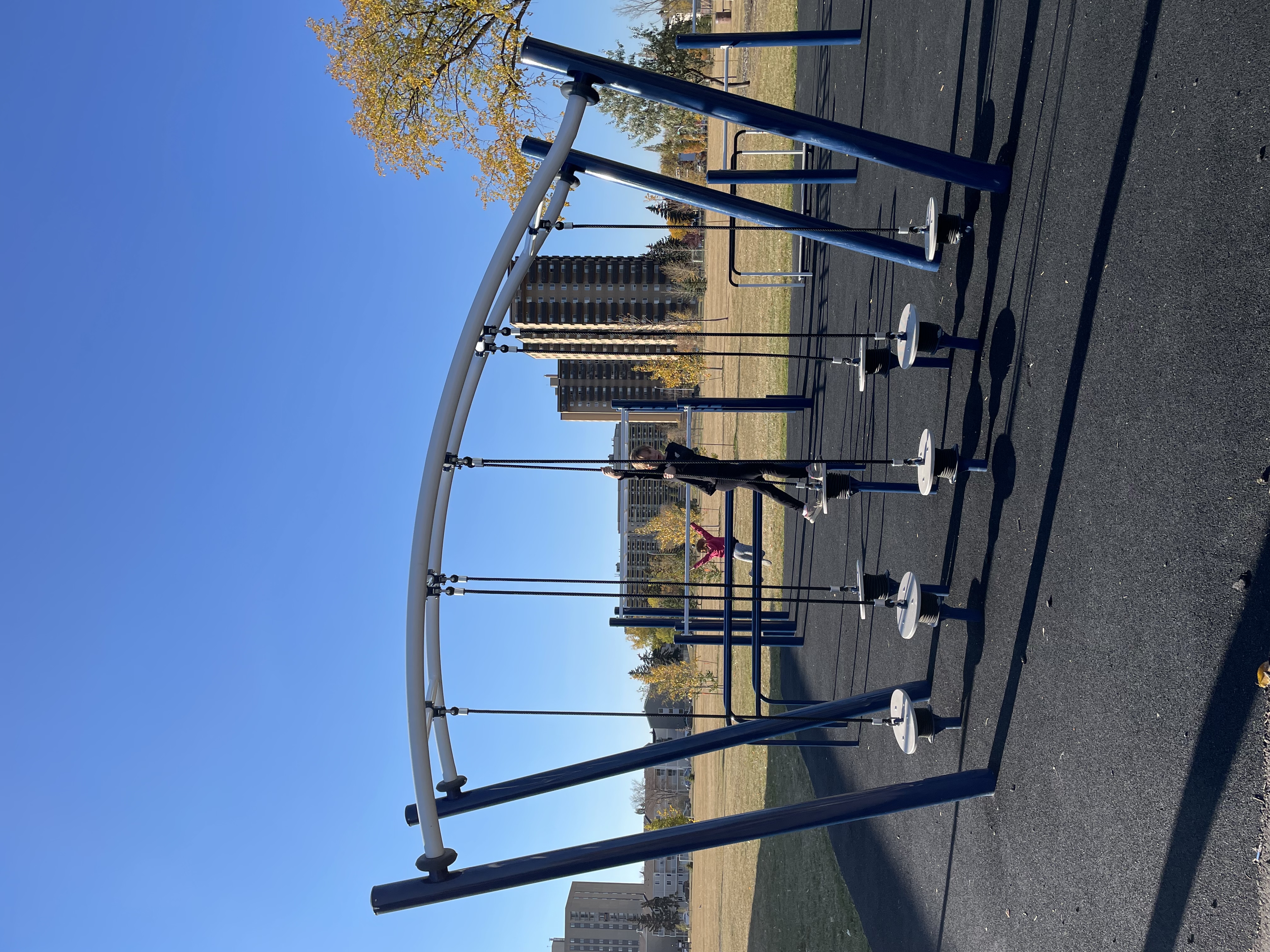 L.Y. Cairns School Playground playground equipment in Edmonton, AB with climbing and sliding features