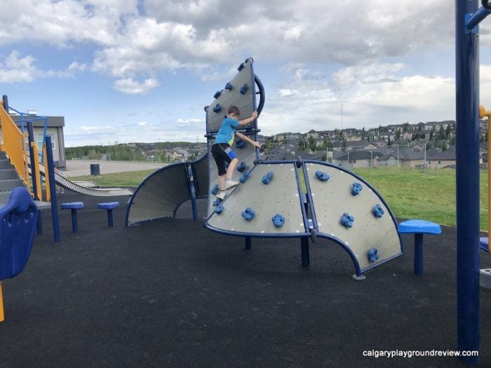 Guardian Angel School Playground playground equipment in CALGARY, AB with safety surfacing and equipment