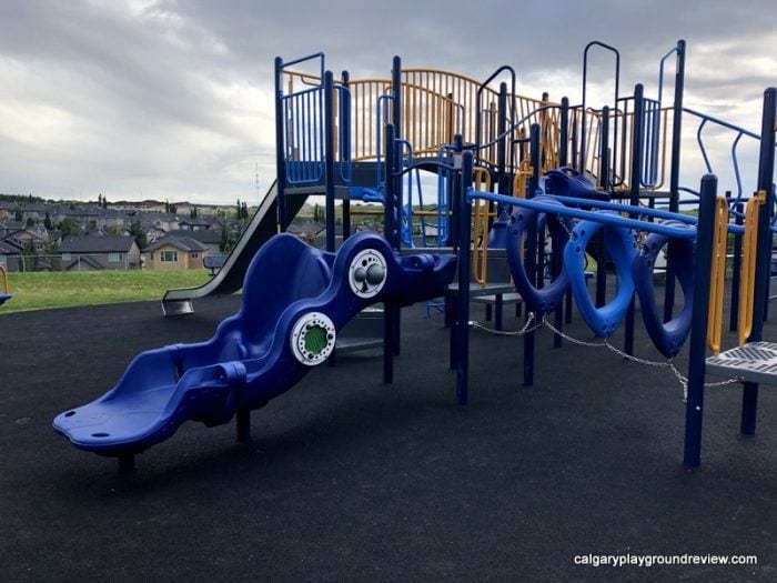 Guardian Angel School Playground playground equipment in CALGARY, AB with climbing and sliding features