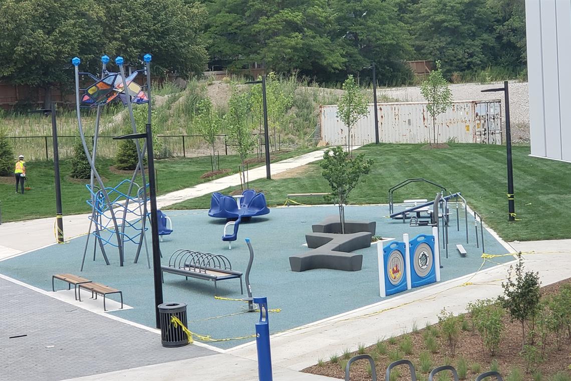 Oakville Trafalgar Community Centre playground equipment in Oakville, ON featuring colorful play structures
