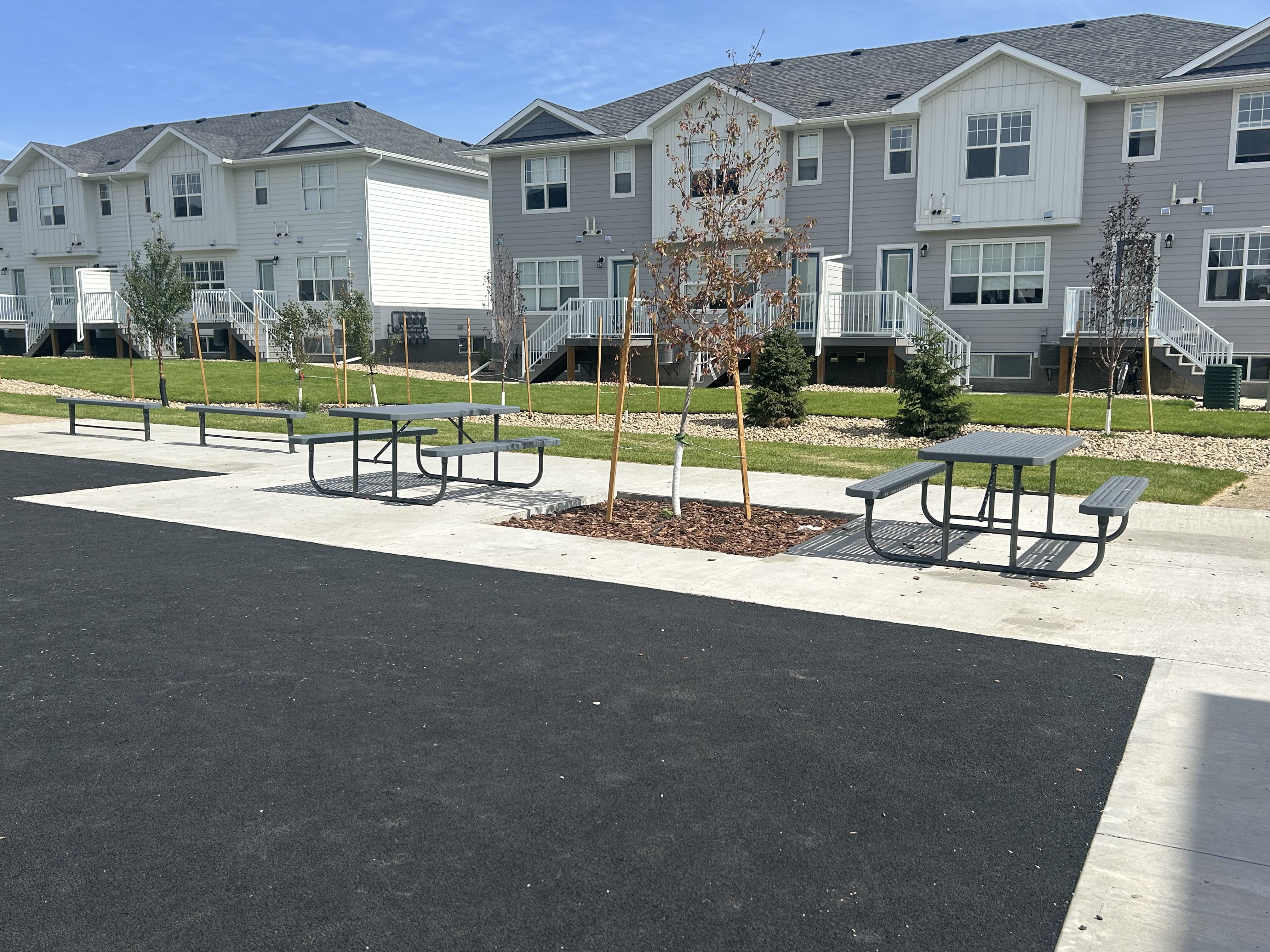 Windsor Park playground equipment in Regina, SK showing community playground space
