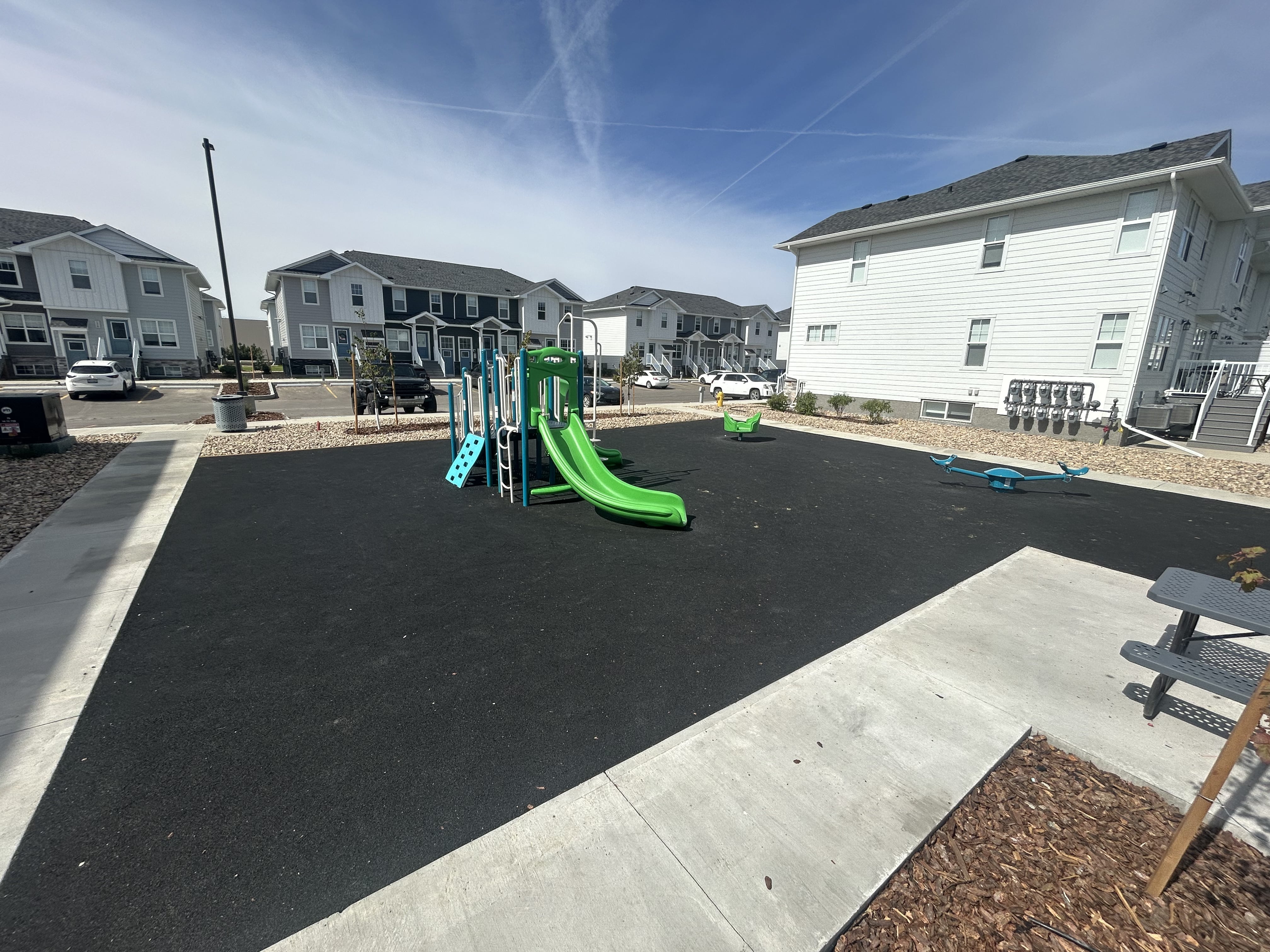 Windsor Park playground equipment in Regina, SK with climbing and sliding features