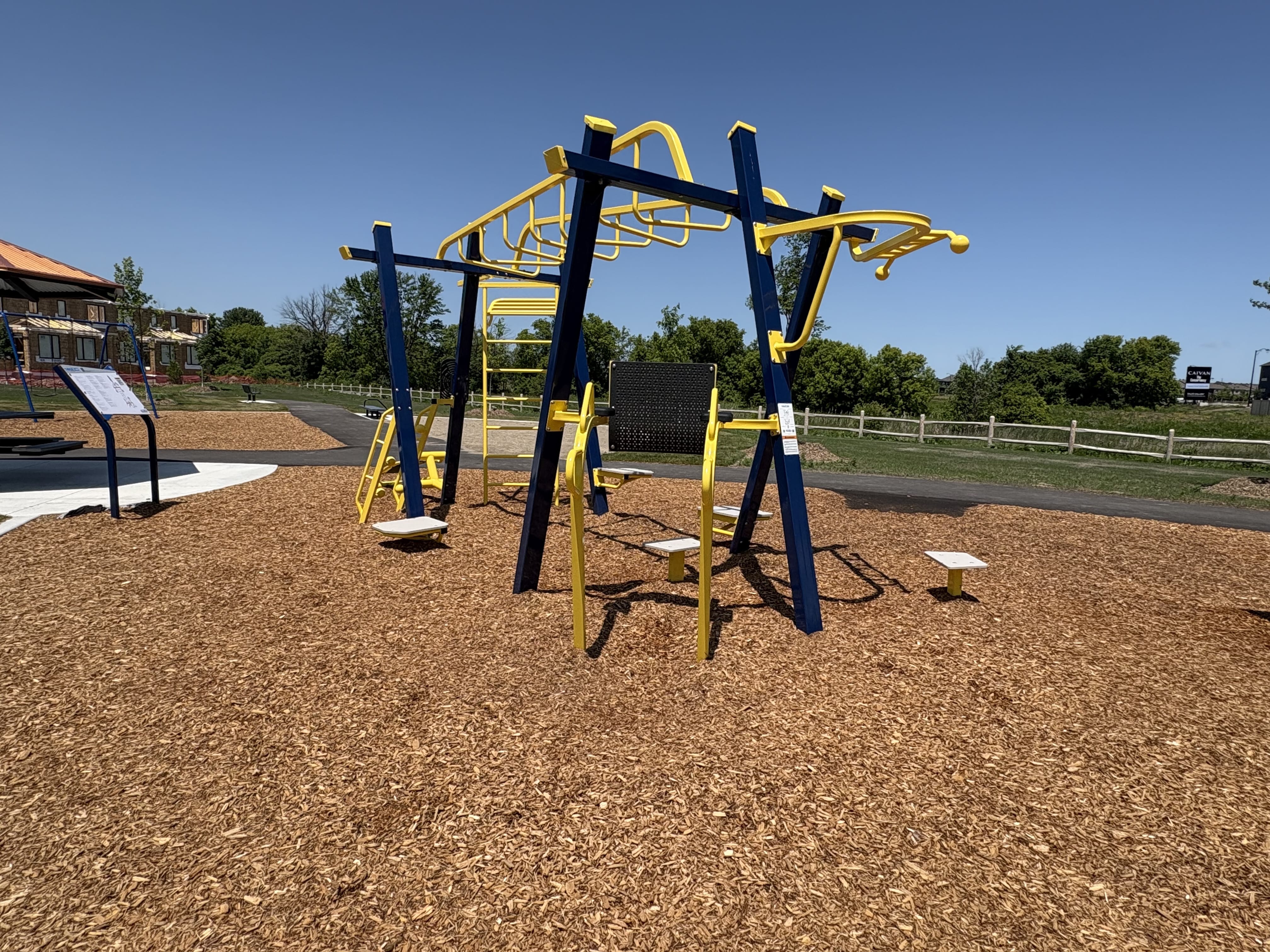 Canoe Park Thrive 450 playground equipment in Ottawa, ON with safety surfacing and equipment