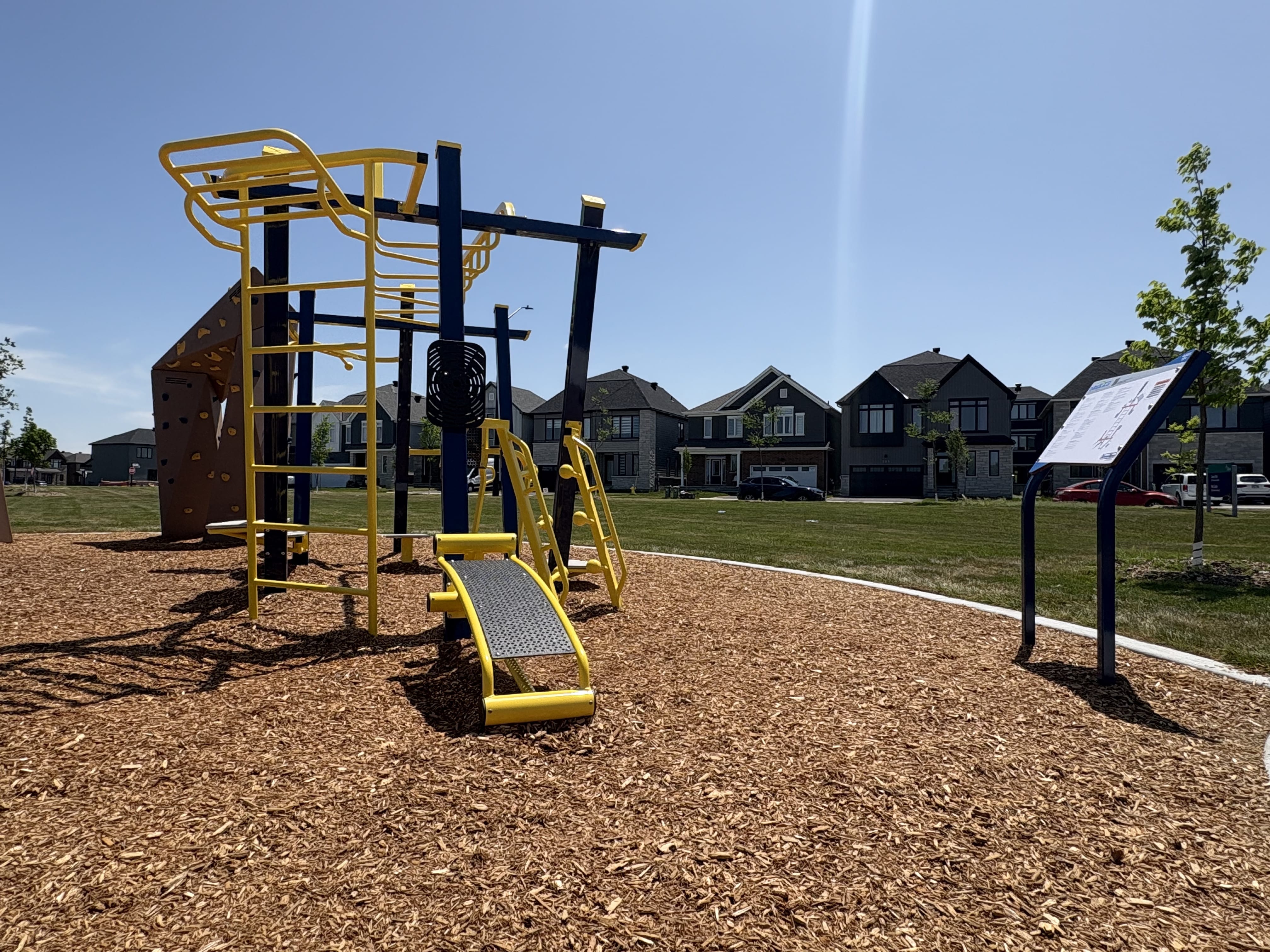 Canoe Park Thrive 450 playground equipment in Ottawa, ON with Zip Swerve Slide equipment