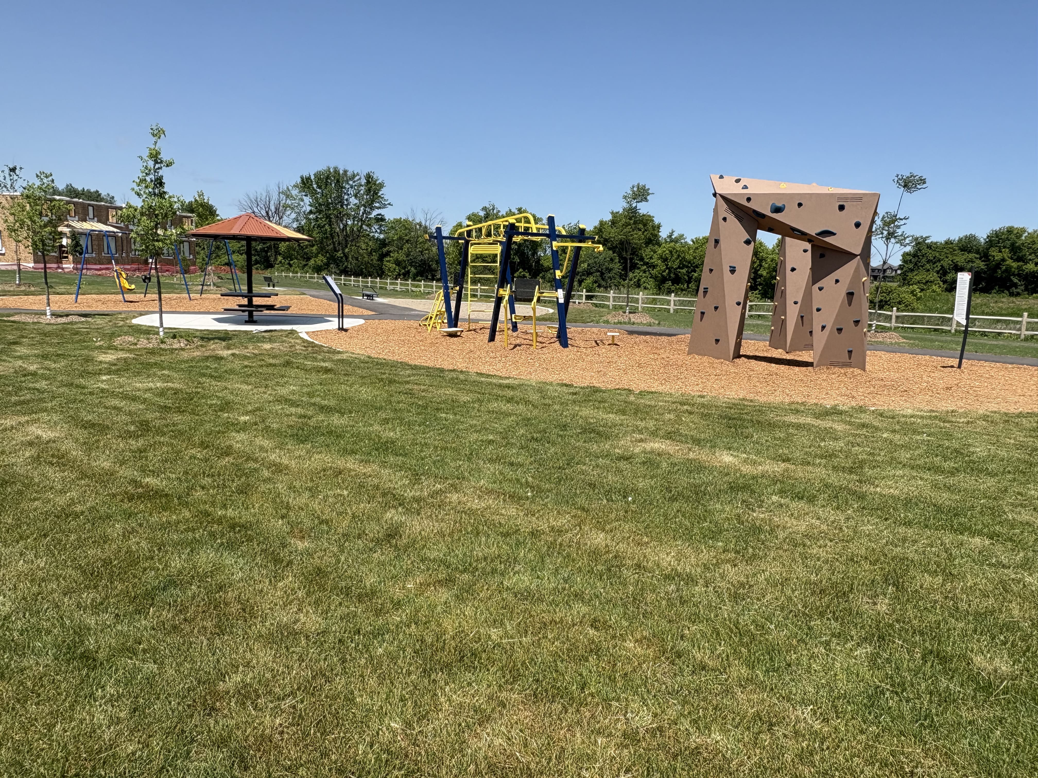 Canoe Park Thrive 450 playground equipment in Ottawa, ON showing Double Rumble & Roll features