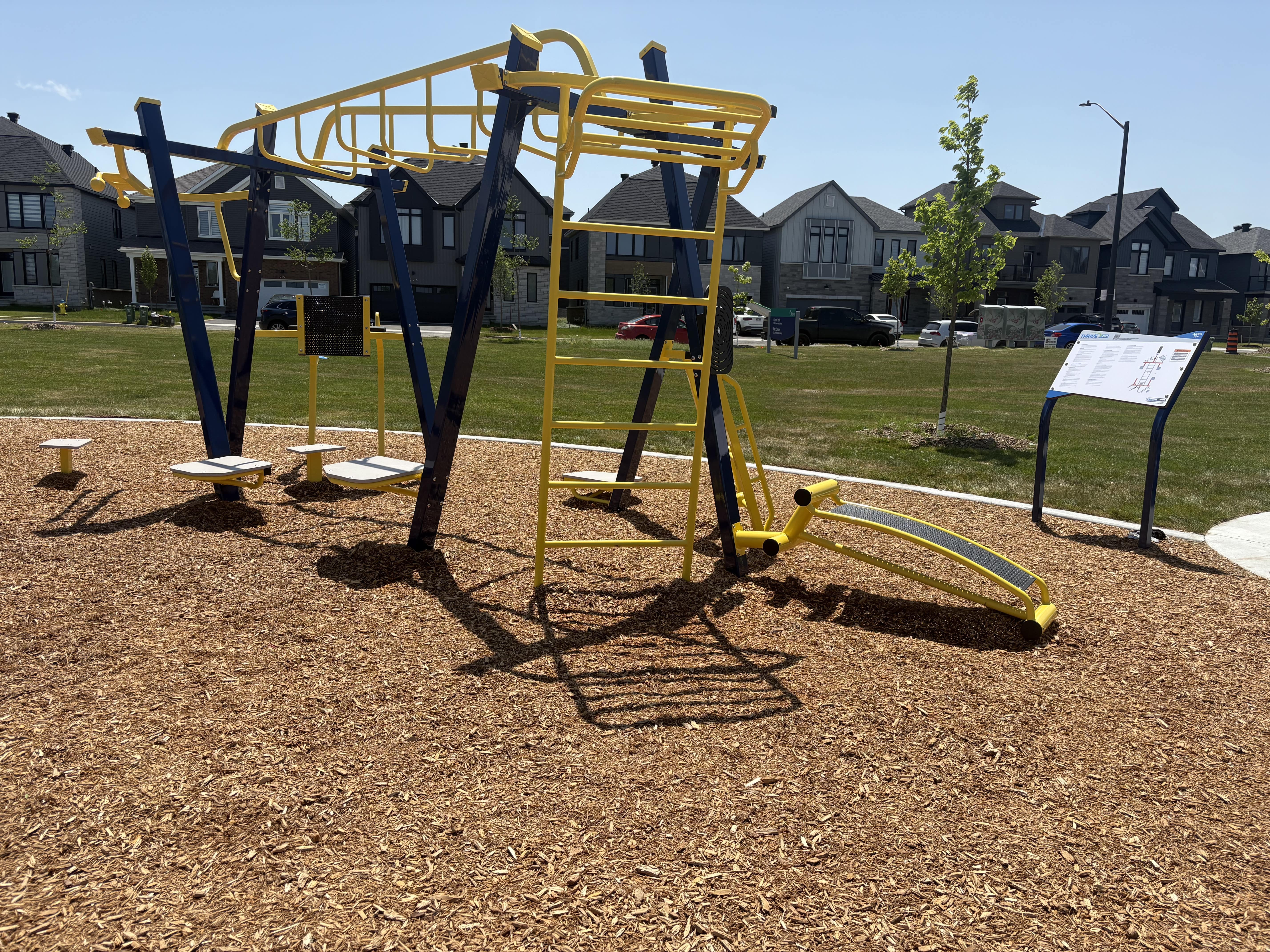 Canoe Park Thrive 450 playground equipment in Ottawa, ON with climbing and sliding features