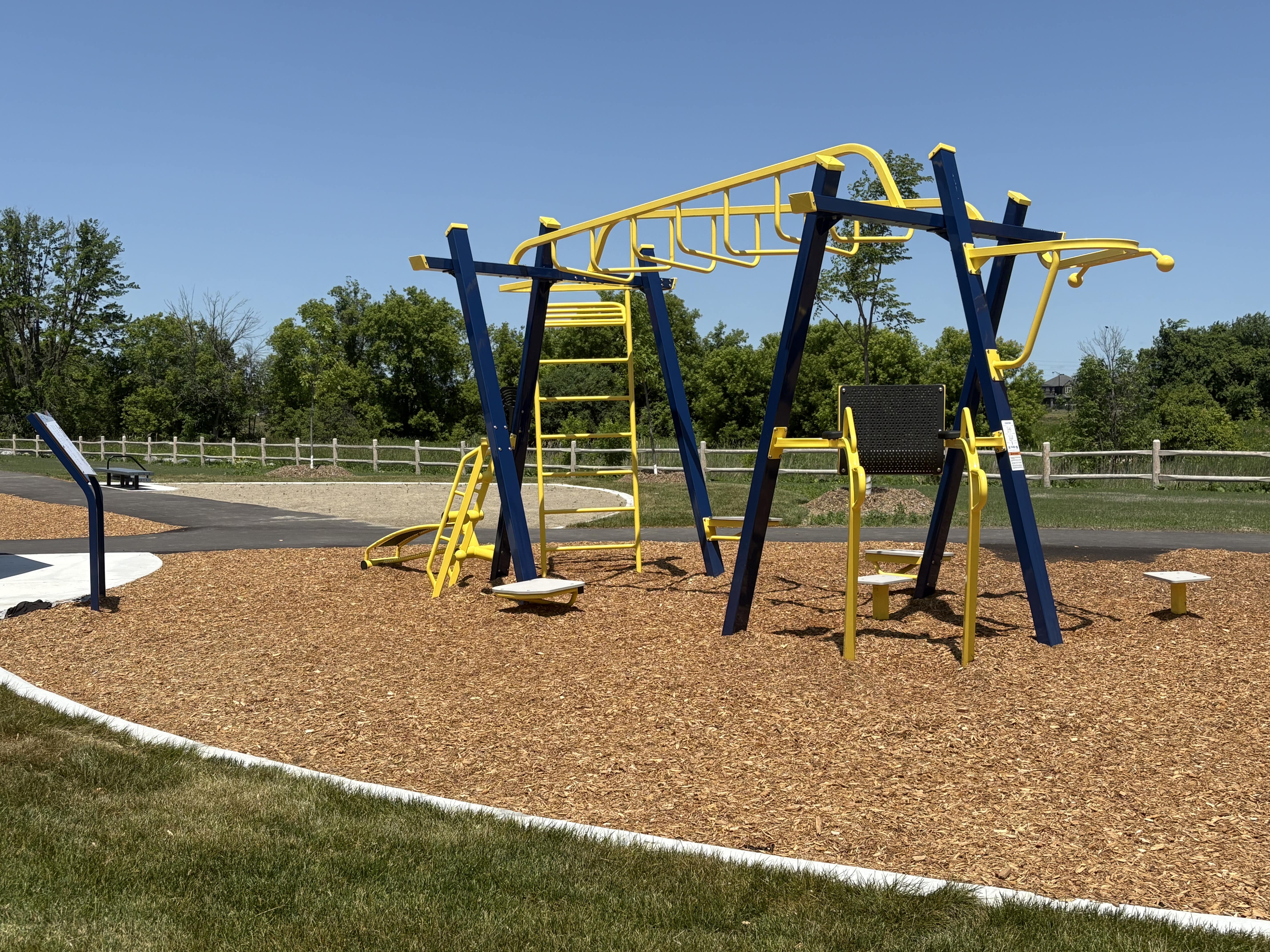 Canoe Park Thrive 450 playground equipment in Ottawa, ON featuring colorful play structures