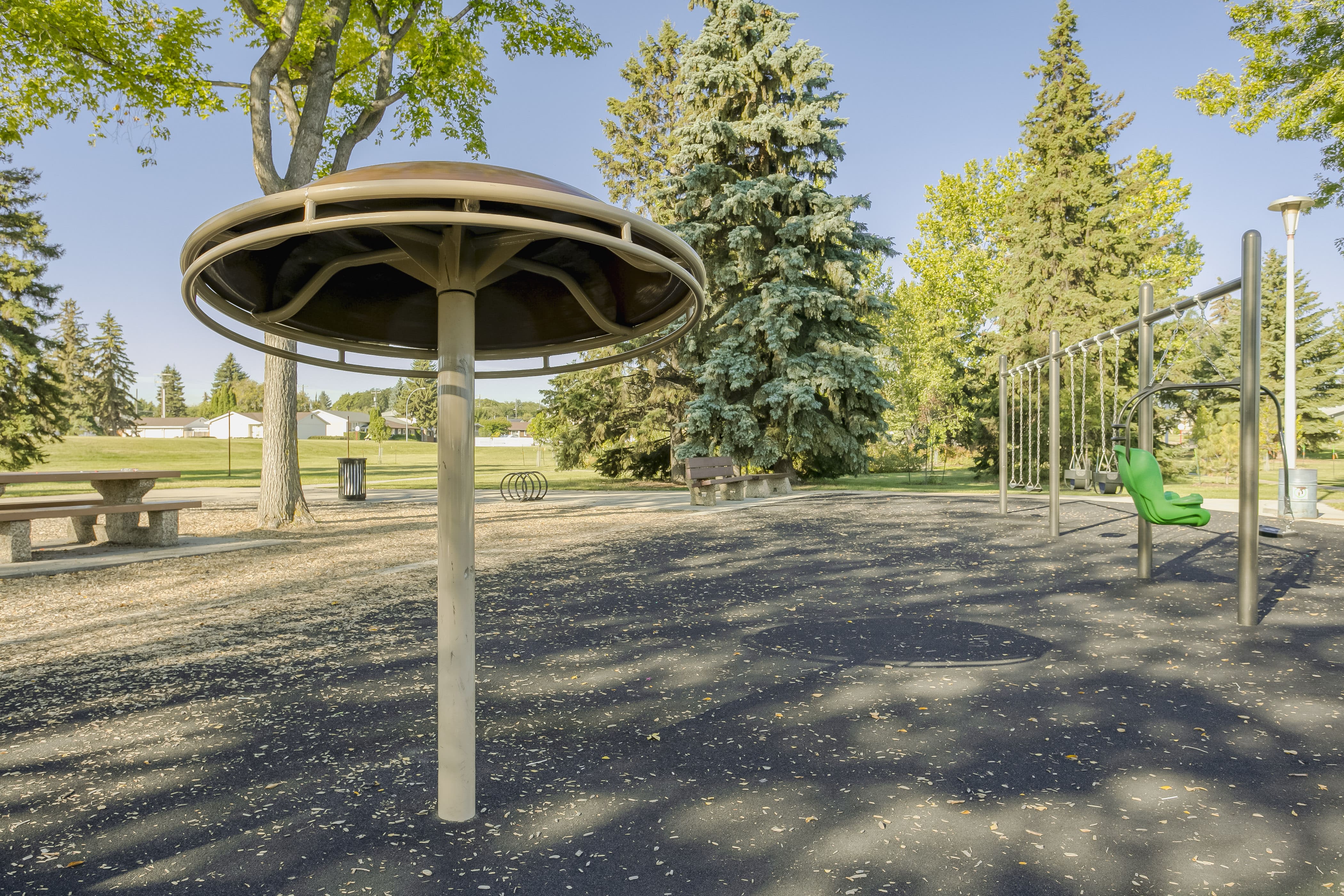 Rundle Heights Community Playground playground equipment in Edmonton, AB featuring energetic play atmosphere