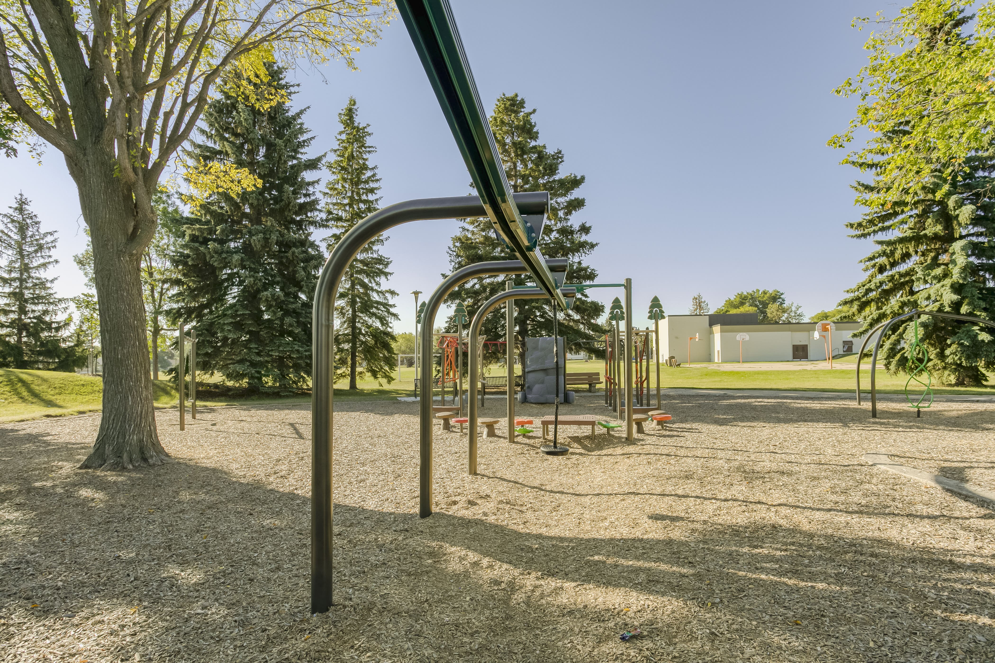 Rundle Heights Community Playground playground equipment in Edmonton, AB featuring GameTime geometric net structure