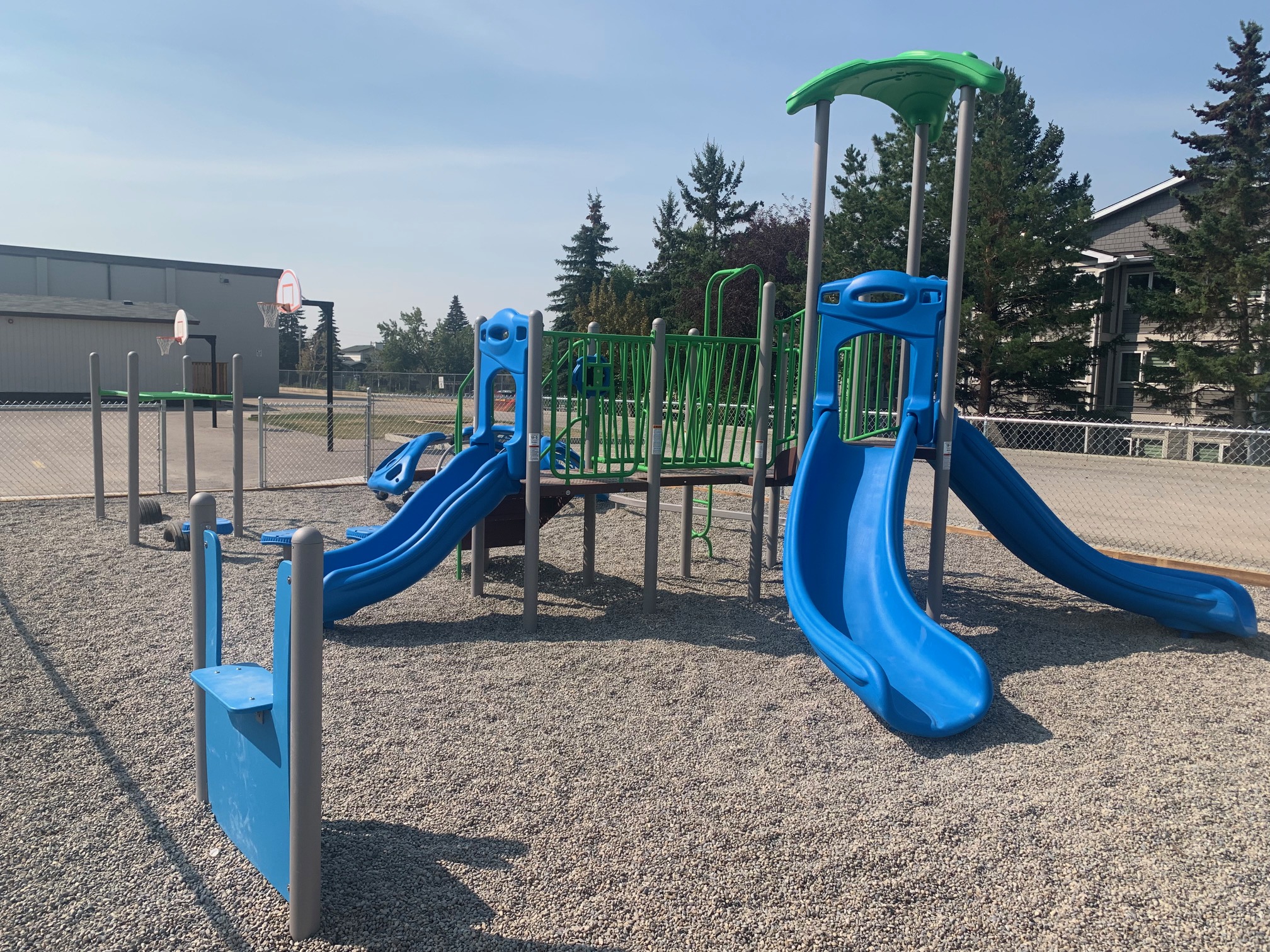 Calgary Christian Preschool playground in Calgary, AB with school playground, preschool playground, Christian school playg...
