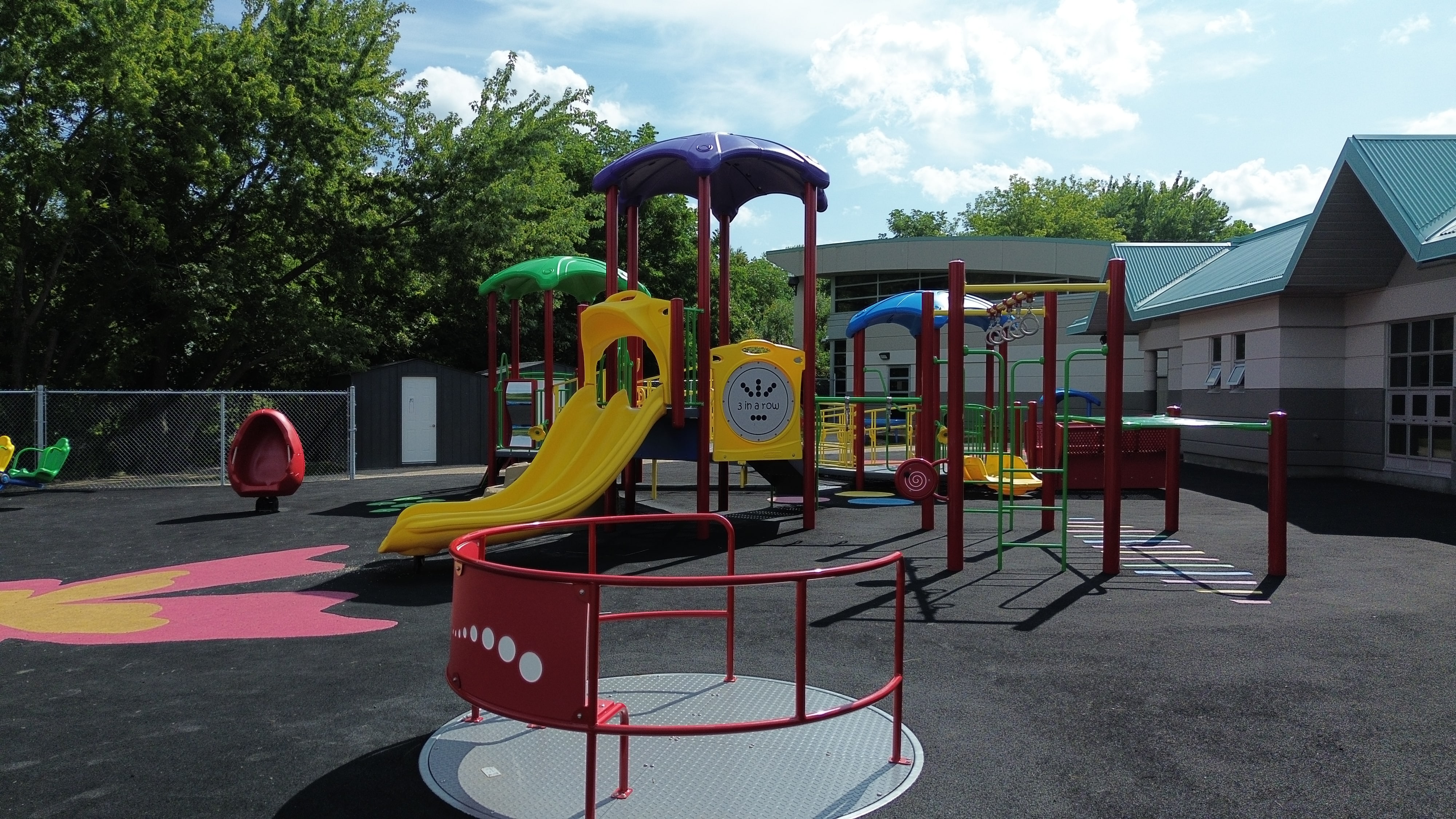 Kids Ability playground in Waterloo, ON with inclusive accessible playground, ages 2-5 design, butterfly-themed surface