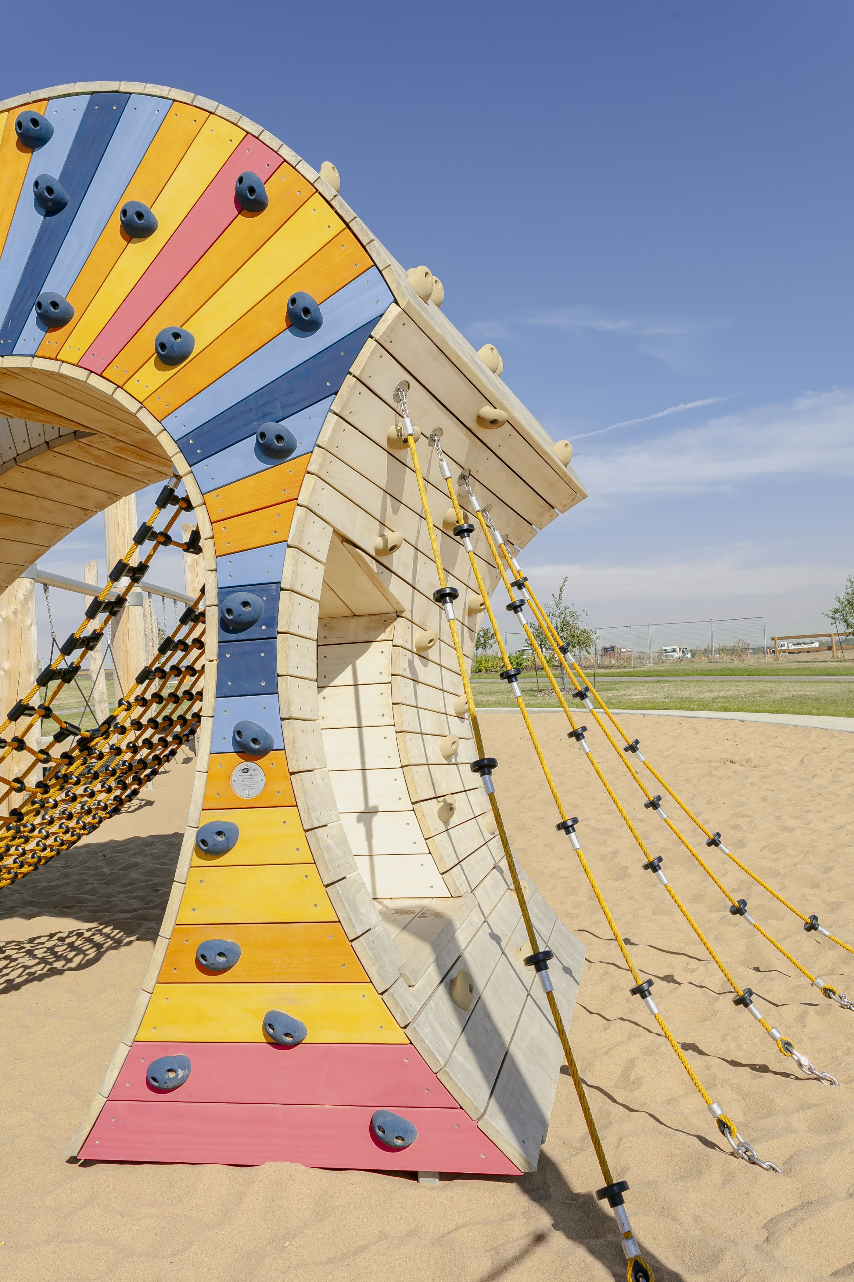 Cambrian Playground playground equipment in Sherwood Park, AB featuring Pont des Arts bridge design