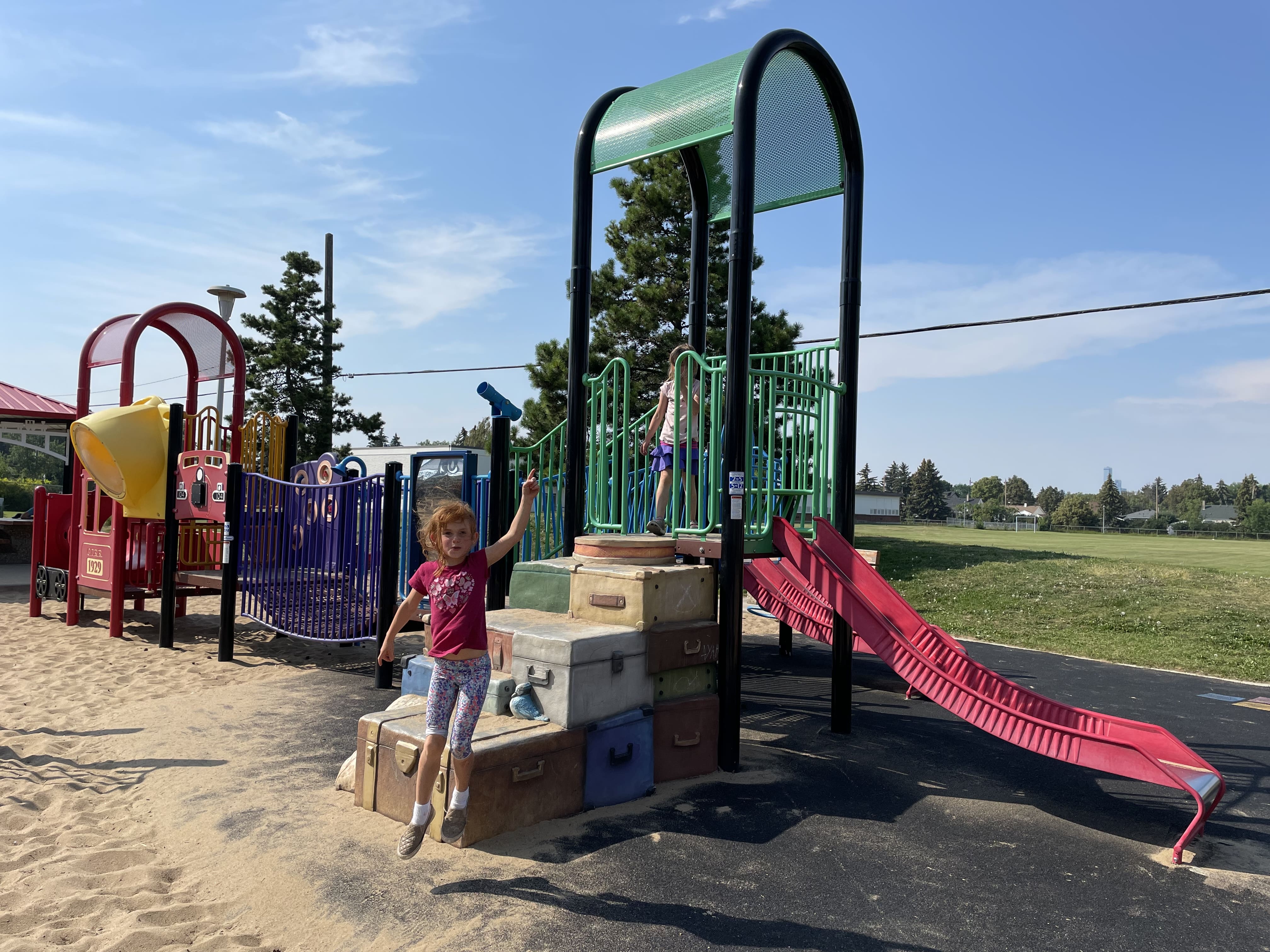 Hazeldean Park playground equipment in Edmonton, AB showing xylophone flowers musical equipment