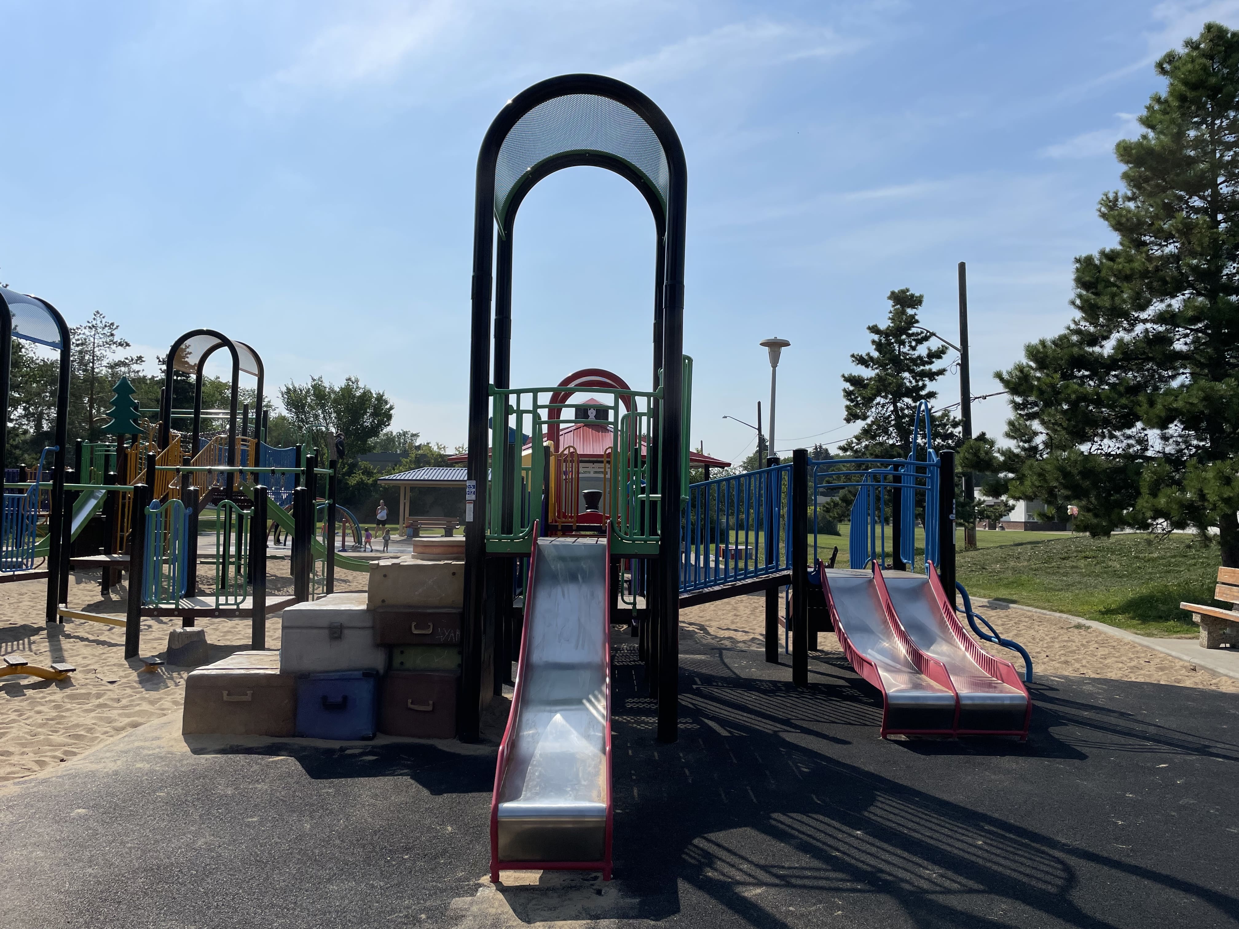 Hazeldean Park playground equipment in Edmonton, AB featuring rainbow stained glass star centerpiece