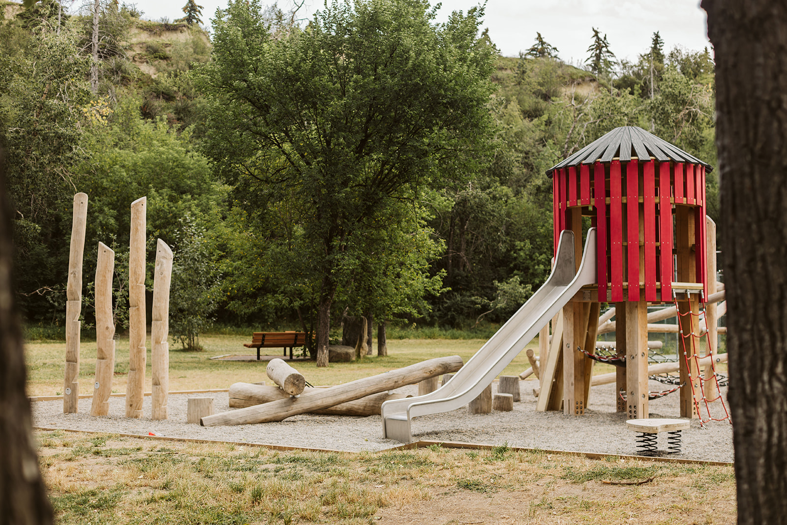 Rideau Roxboro Natural Community Playground playground equipment in Calgary, AB with national demonstration site standards