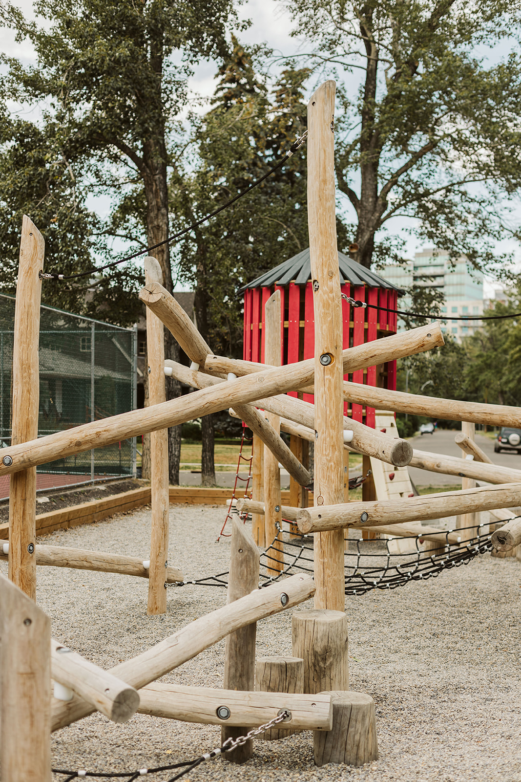 Rideau Roxboro Natural Community Playground playground equipment in Calgary, AB featuring Earthscape Junior Tower