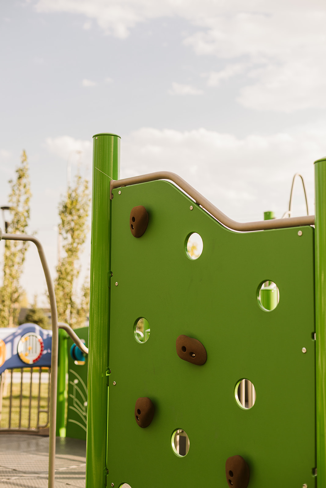 Horizon Housing playground equipment in Calgary, AB featuring Catholic school playground design