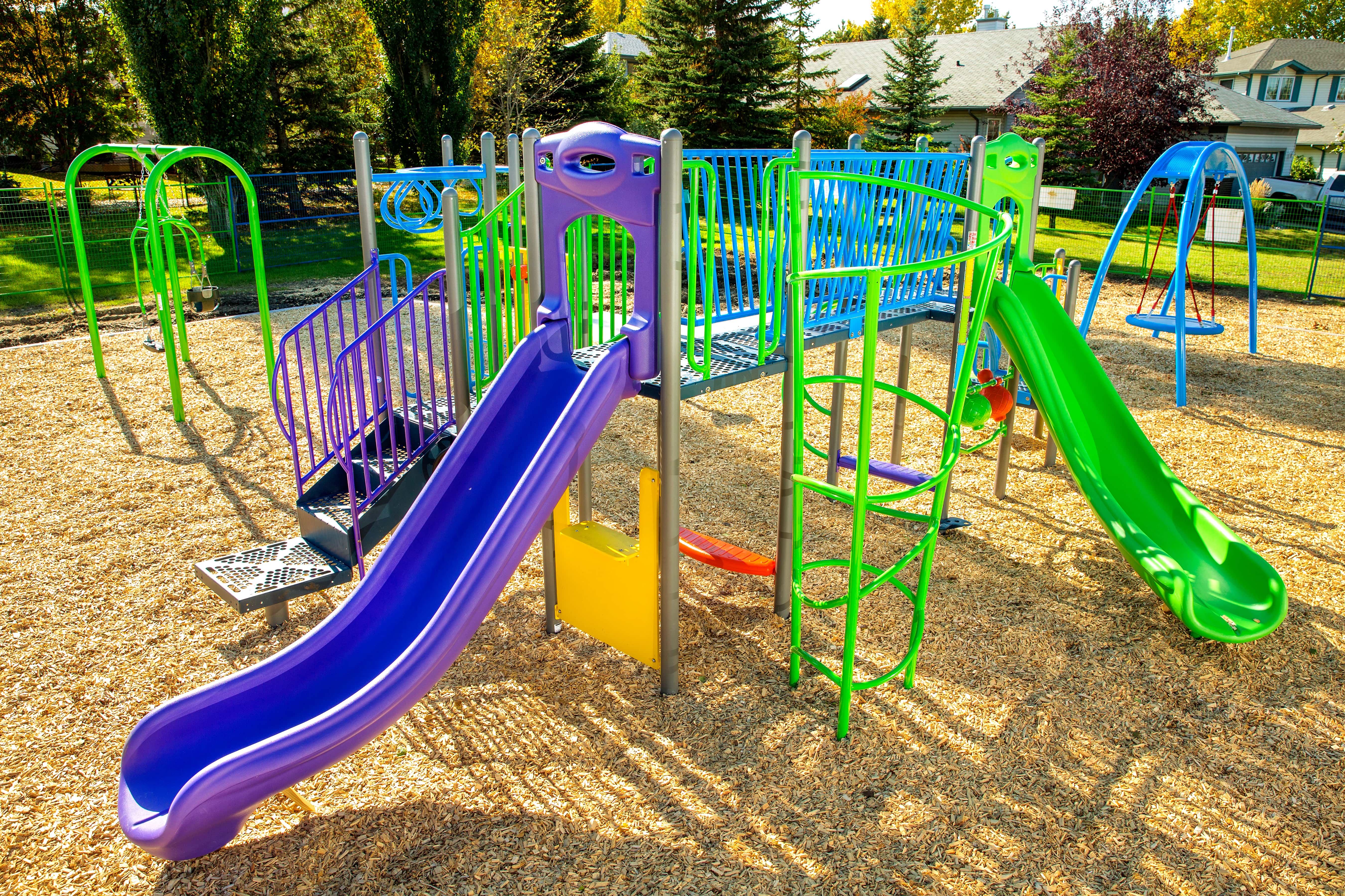 Fieldstone Park playground equipment in Edmonton, AB showing residential playground design