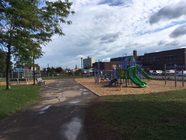 Parkdale School playground equipment in Hamilton, ON featuring splash park water play