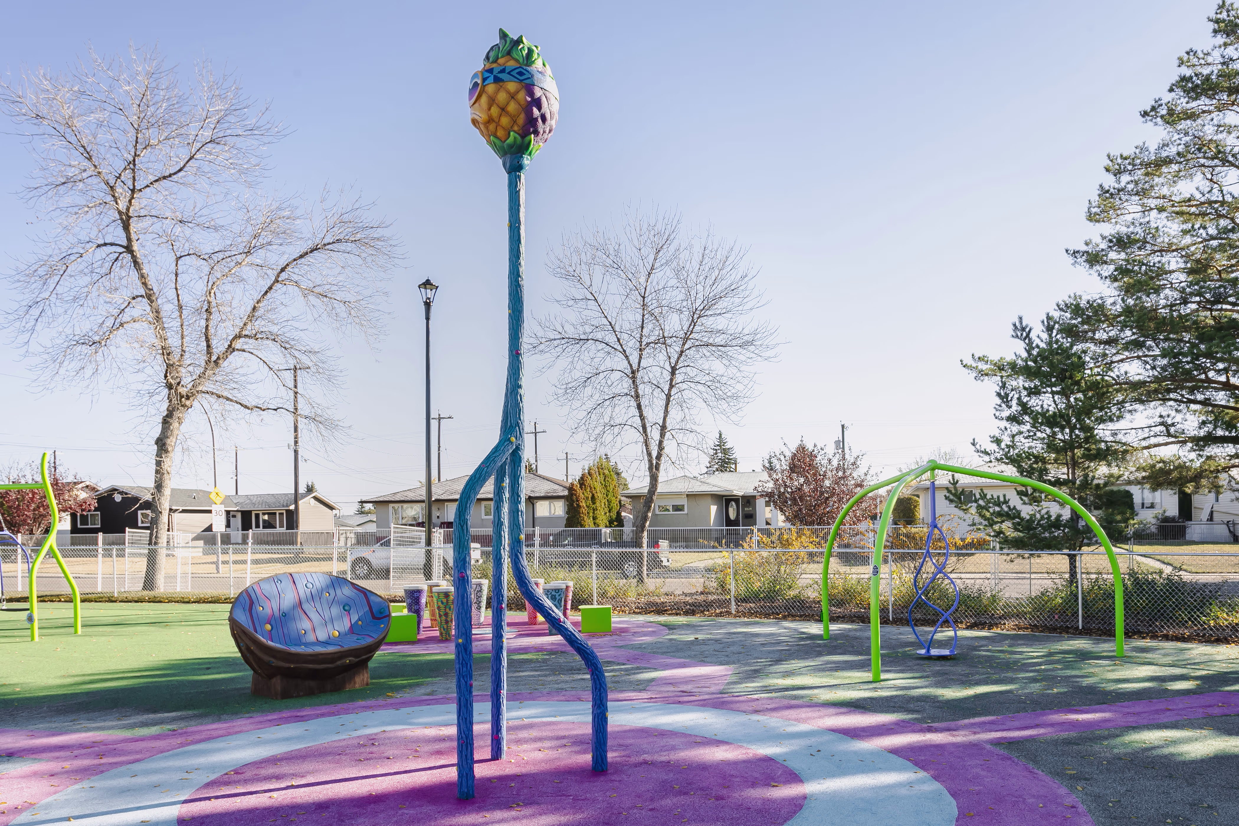 Balwin Pineapple Park (Edmonton, AB) playground in Edmonton, AB - play area surfacing and safety features