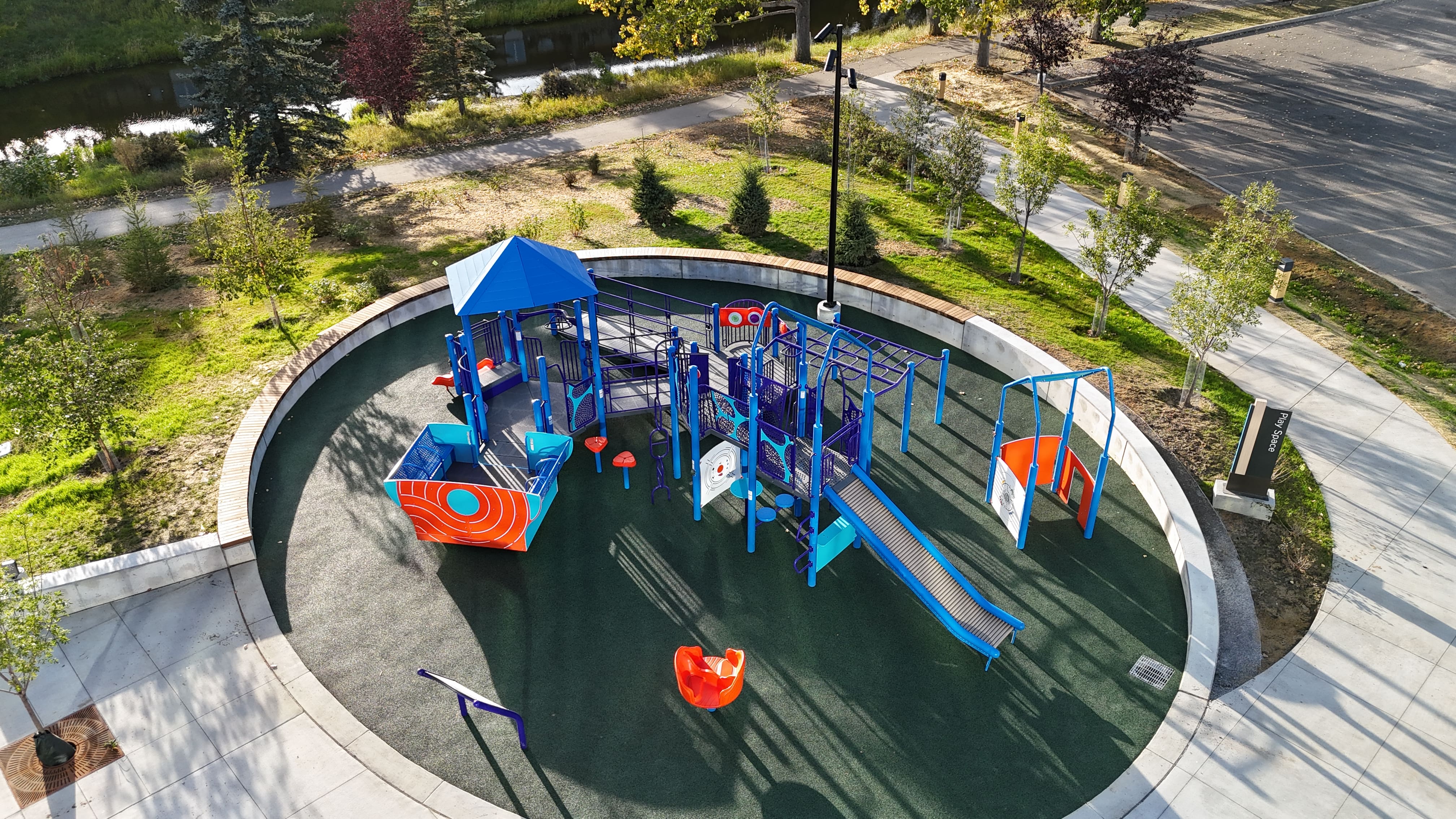Inspire Playground playground in Airdrie, AB - play area surfacing and safety features