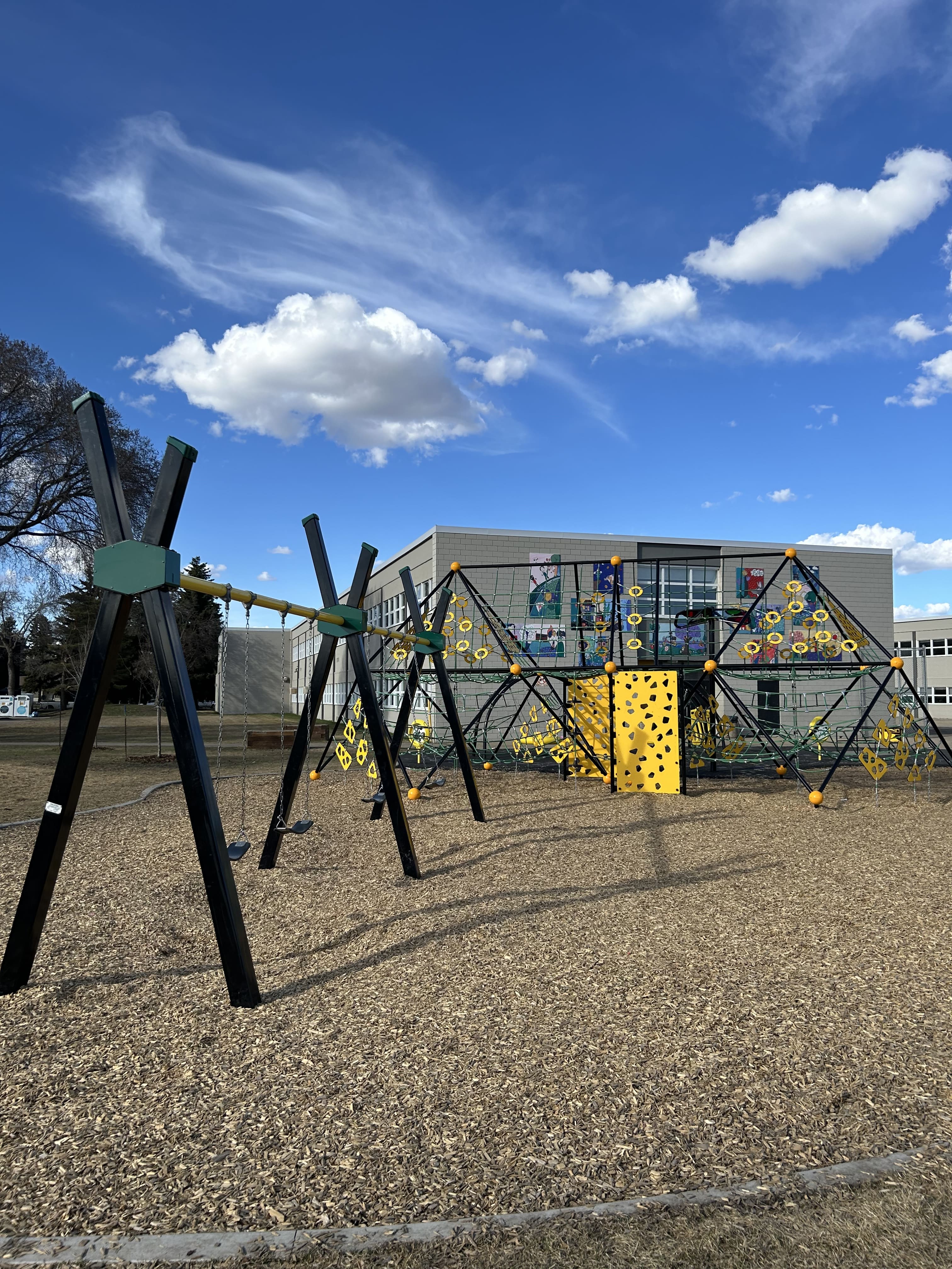 Hardisty School (Edmonton, AB) playground in Edmonton, AB - playground swings and slides