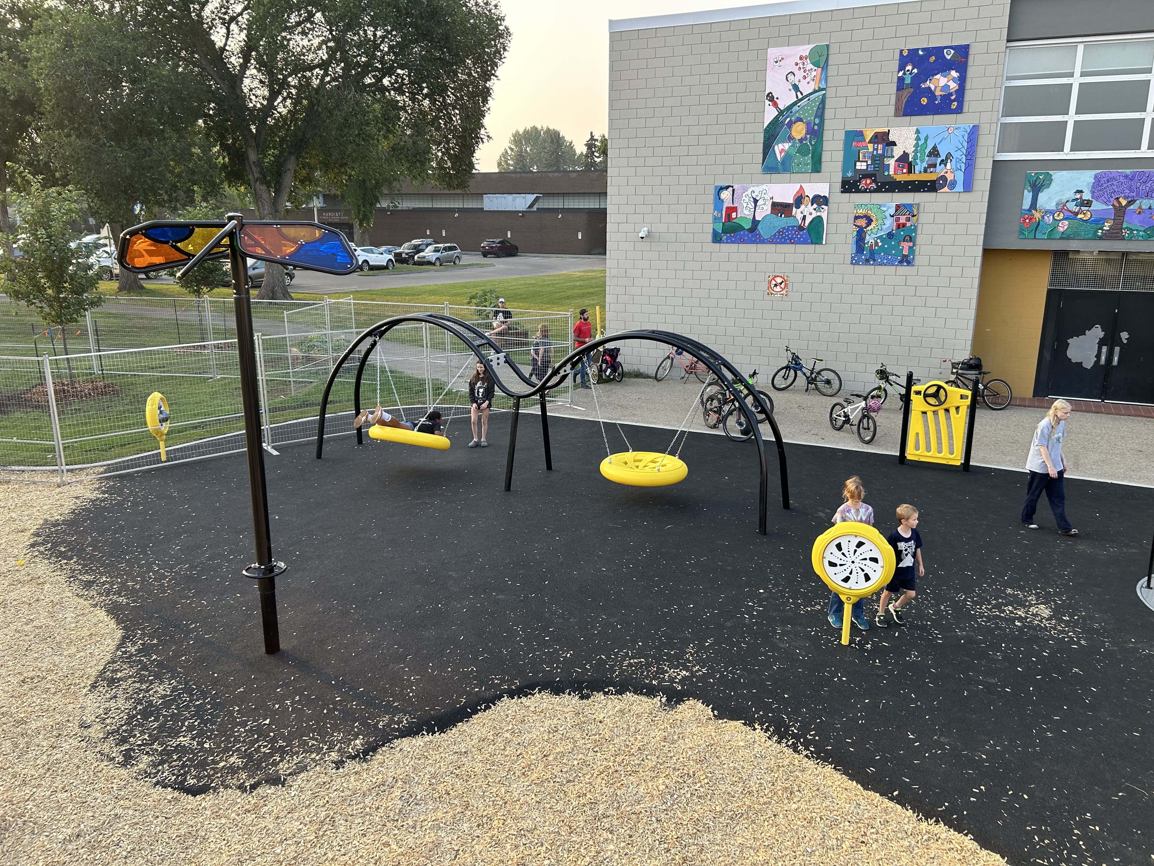 Hardisty School (Edmonton, AB) playground in Edmonton, AB - play area surfacing and safety features