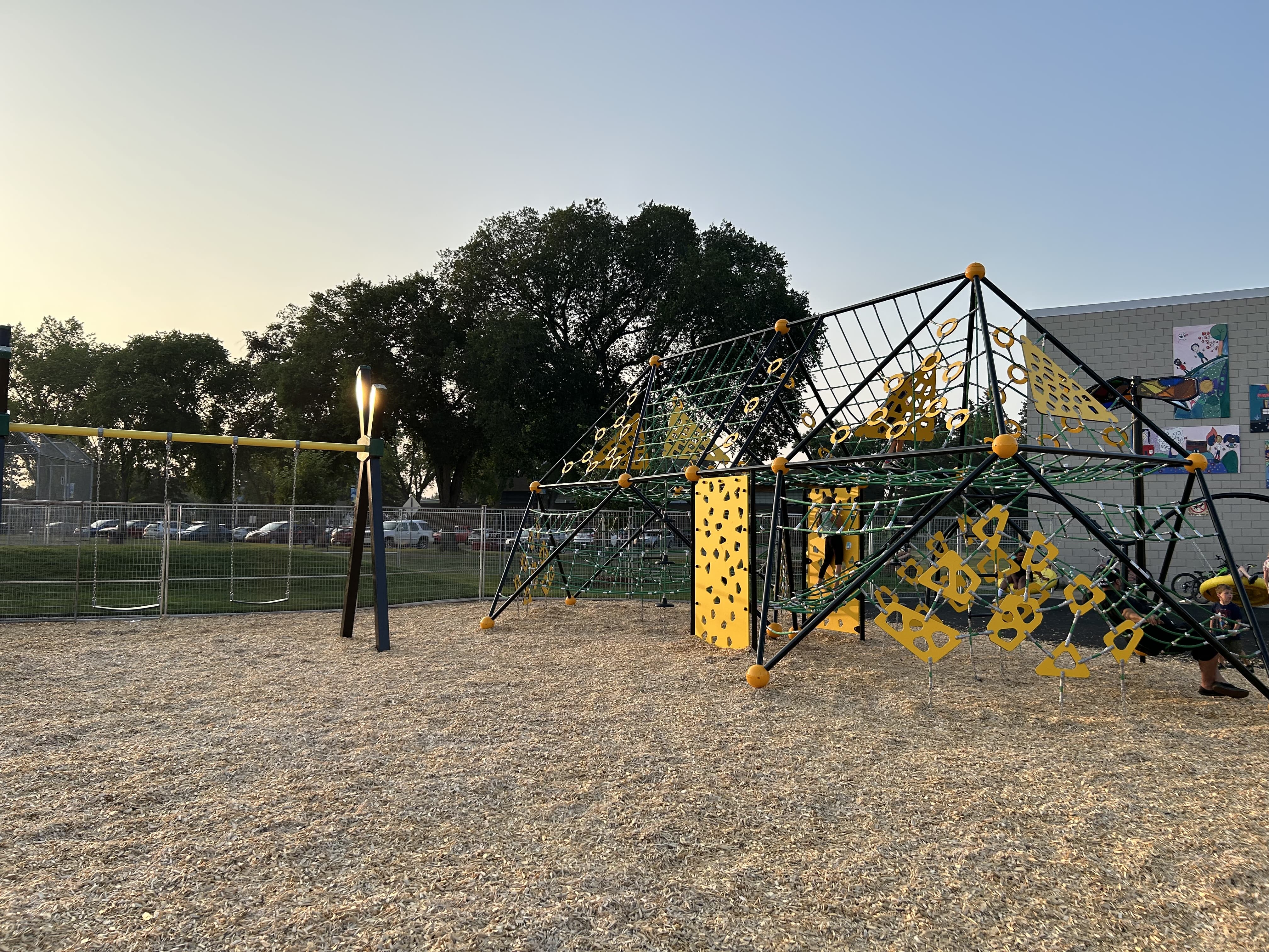 Hardisty School (Edmonton, AB) playground in Edmonton, AB - play area surfacing and safety features