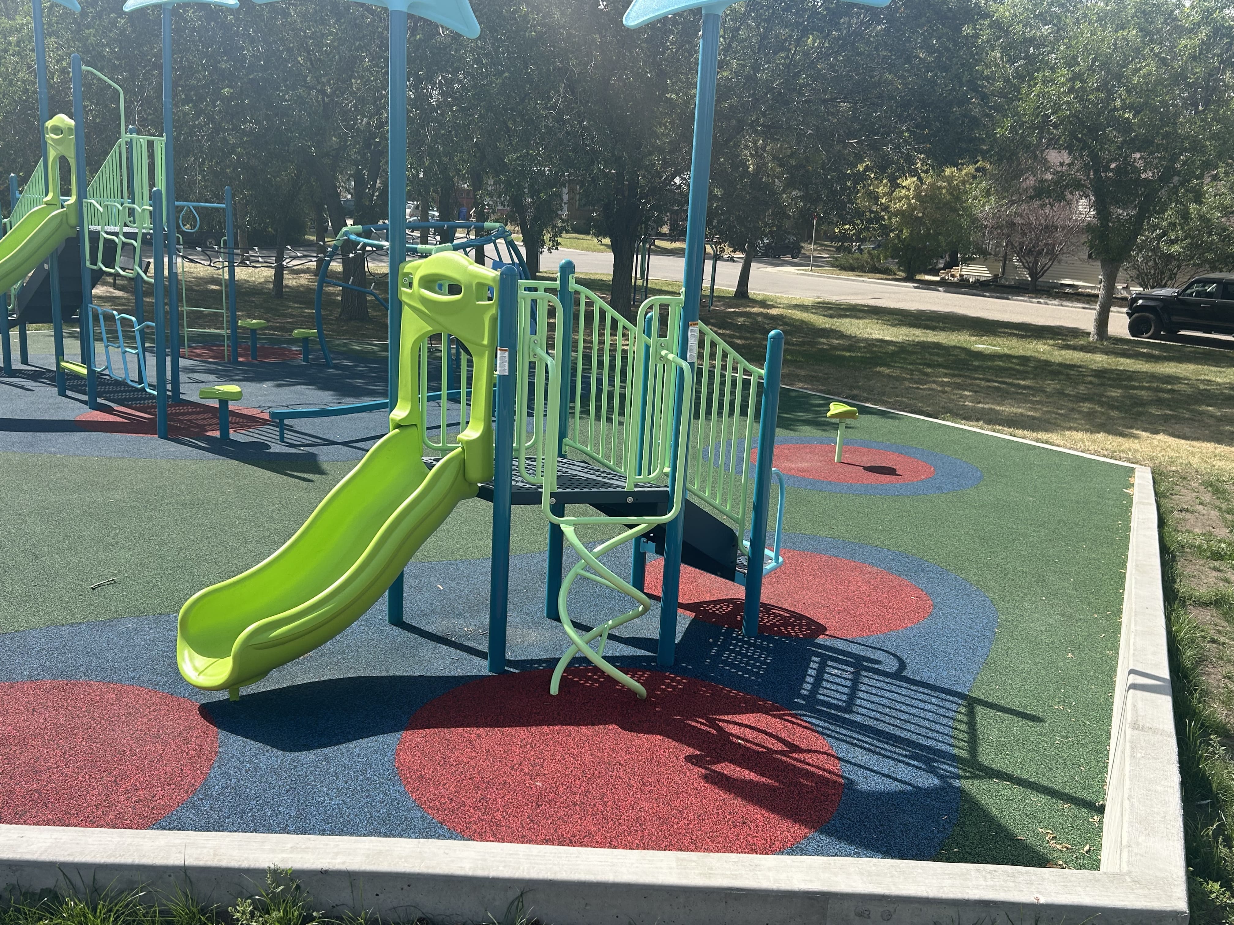 Benson Park playground in Regina, SK - accessible play equipment