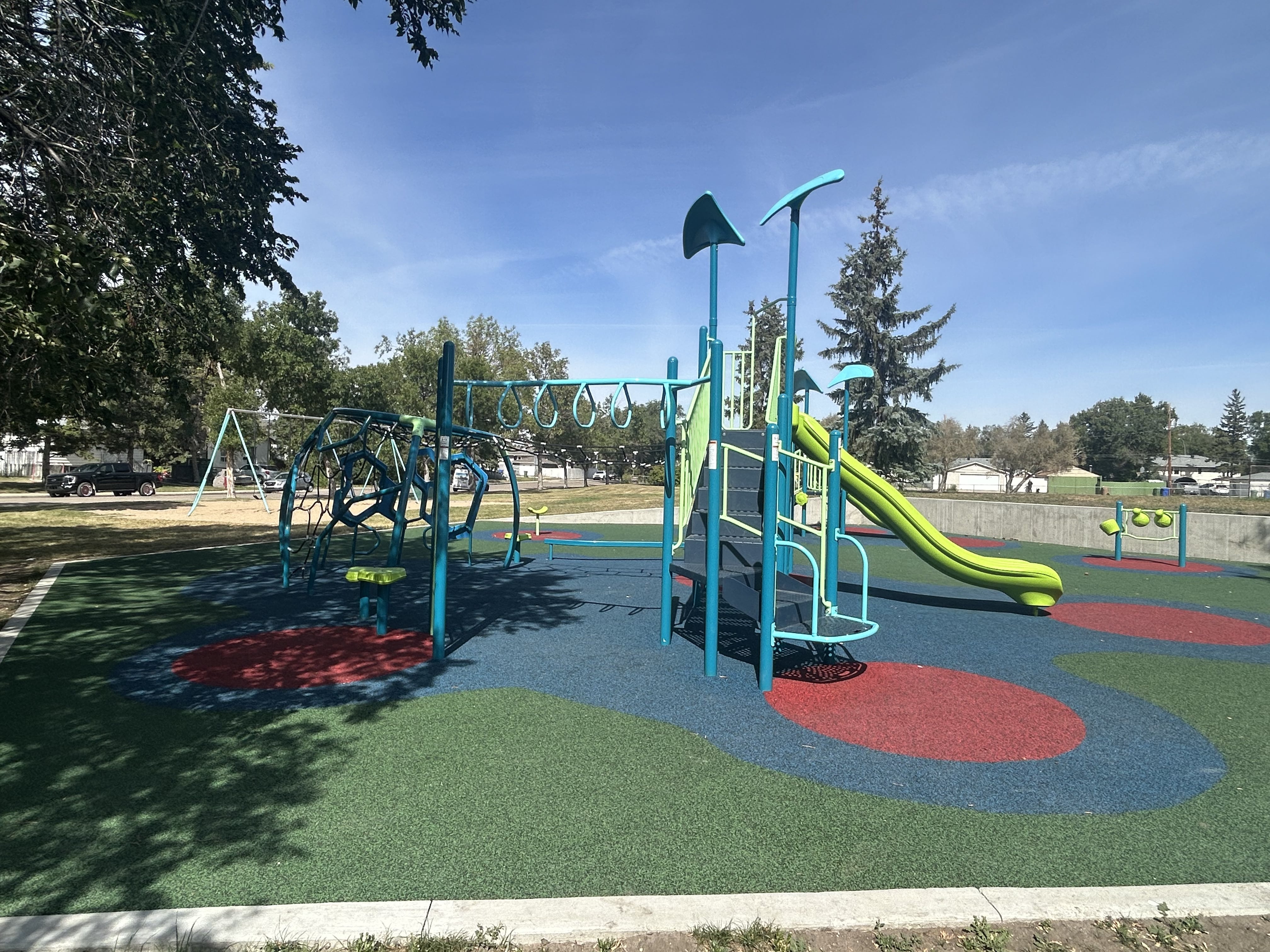 Benson Park playground in Regina, SK - playground swing sets and slides